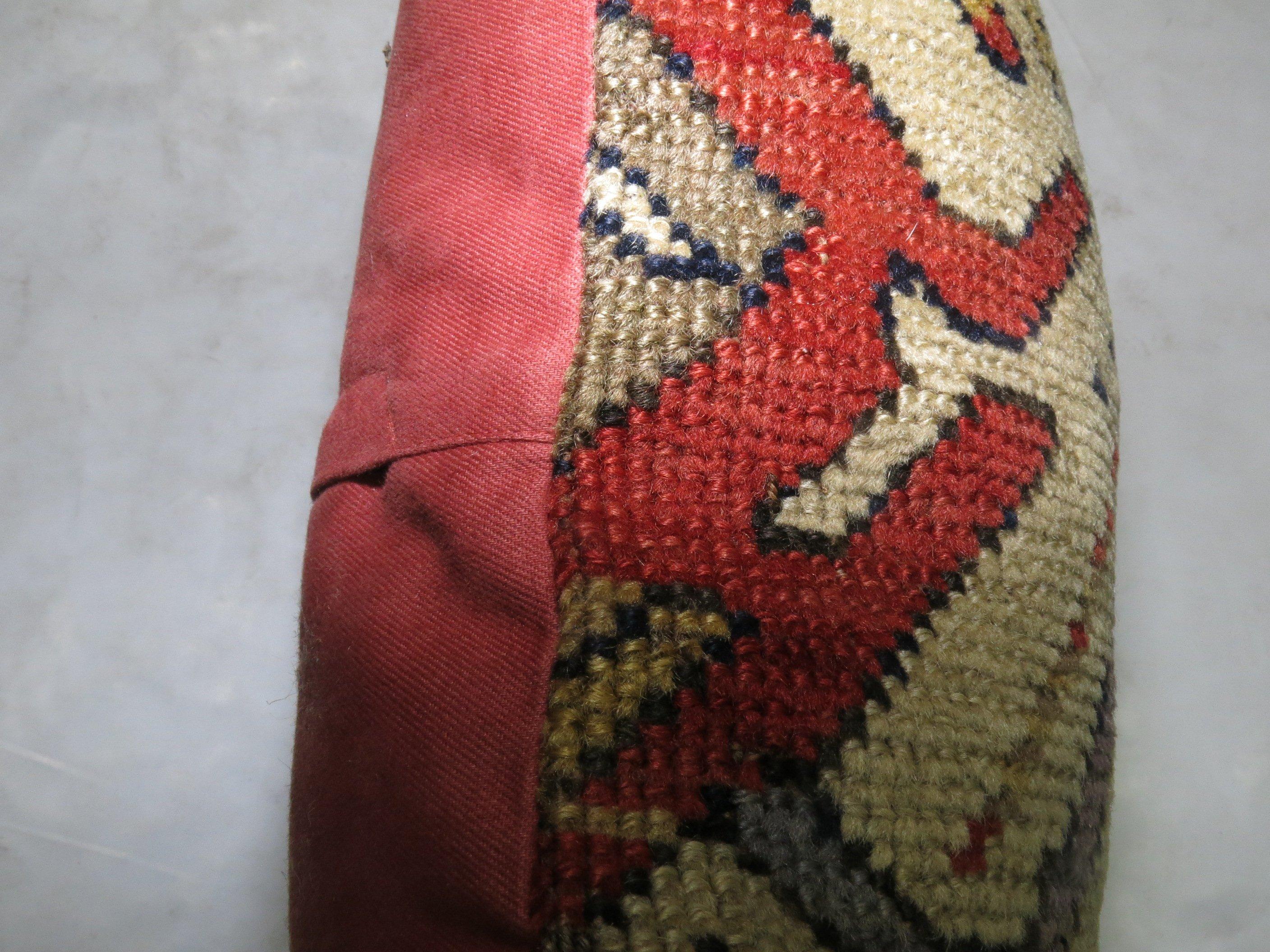 Pillow made from a 19th century Kazak rug.