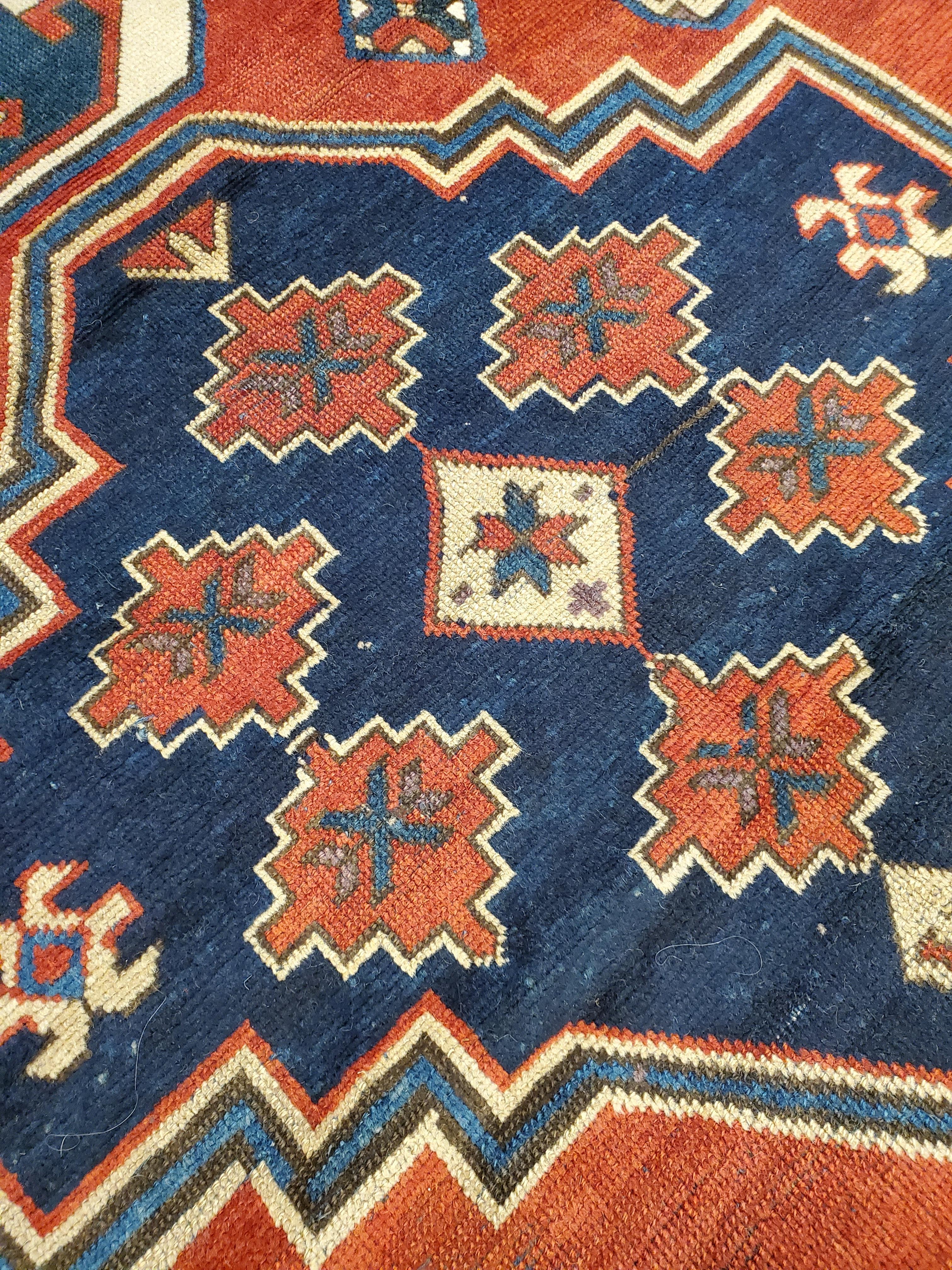 Hand-Knotted Antique Kazak Carpet, Handmade Wool, Rust, Ivory, Navy, Light Blue and Geometric For Sale