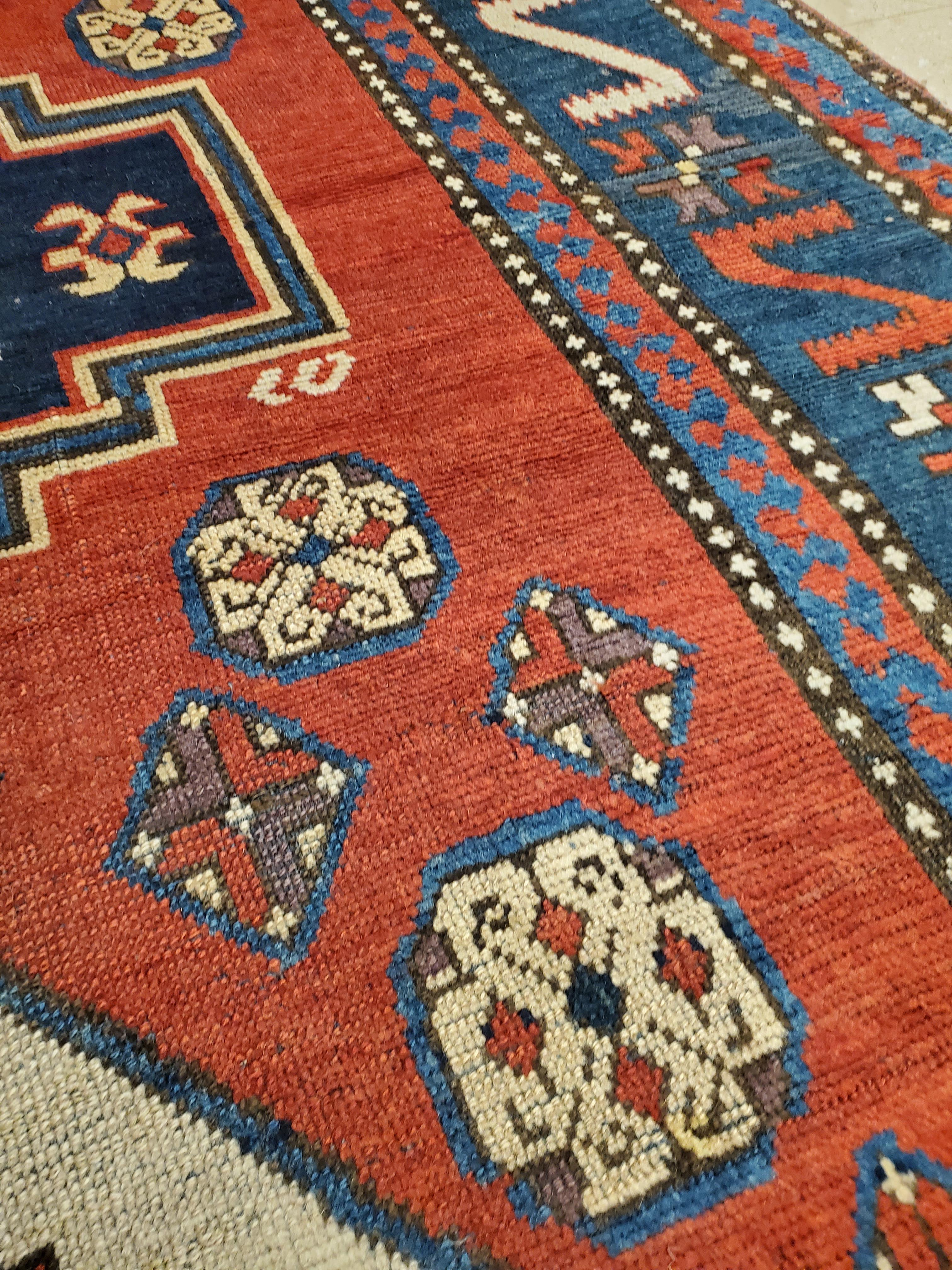 Antique Kazak Carpet, Handmade Wool, Rust, Ivory, Navy, Light Blue and Geometric For Sale 1