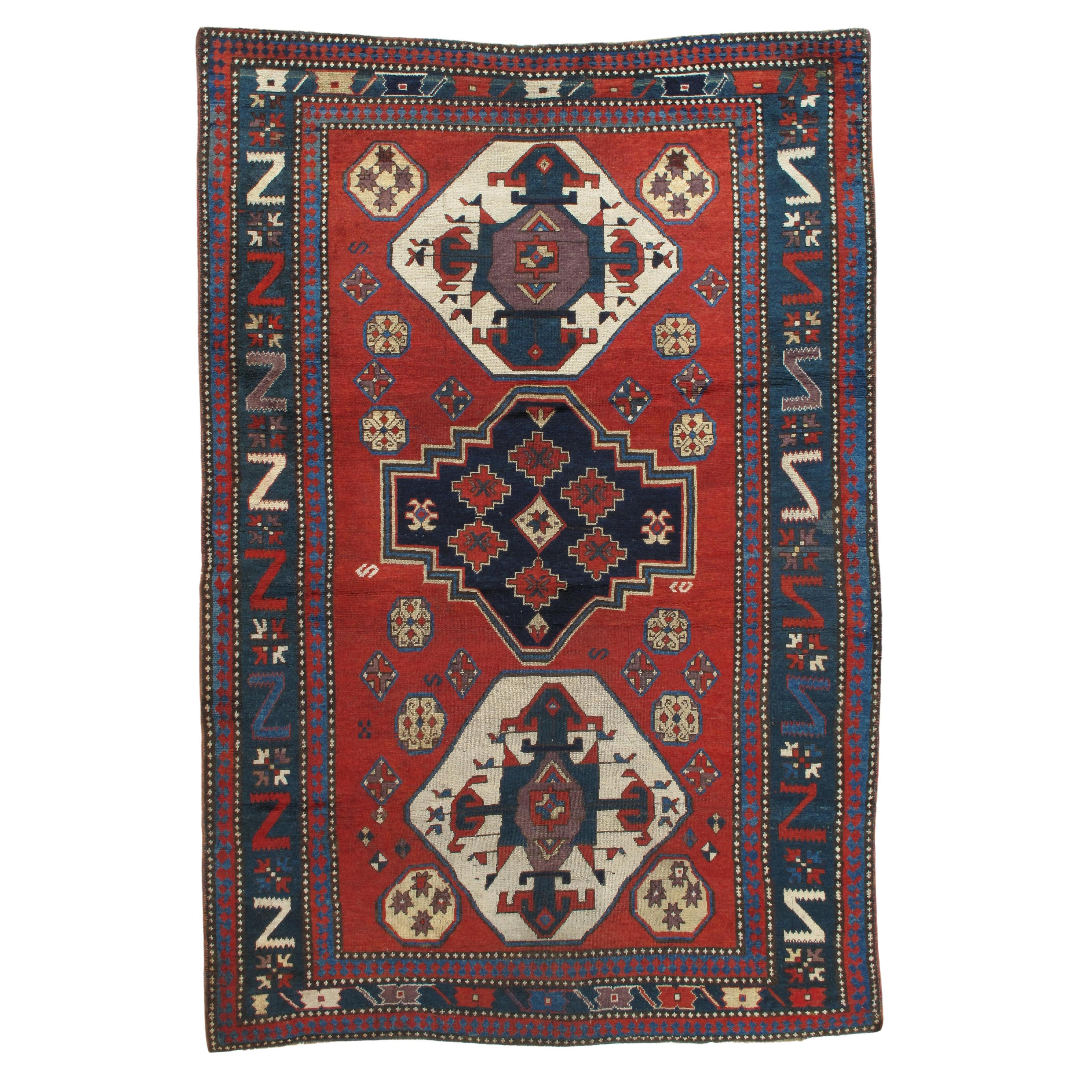 Antique Kazak Carpet, Handmade Wool, Rust, Ivory, Navy, Light Blue and Geometric For Sale