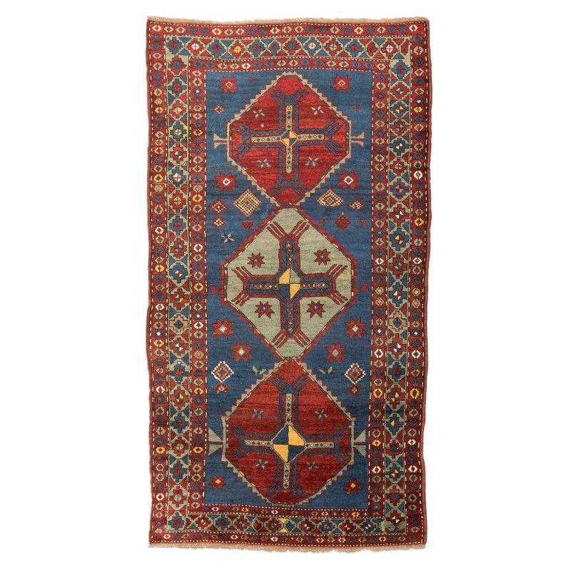 Late 19th Century, Caucasian Wool Rug, Kazak, Geometric Design, circa 1900
Ancient rug from the Caucasus region.
- Design of three central diamonds two in red and the central one in greenish tones.
- Design of geometric figures which gives a tribal