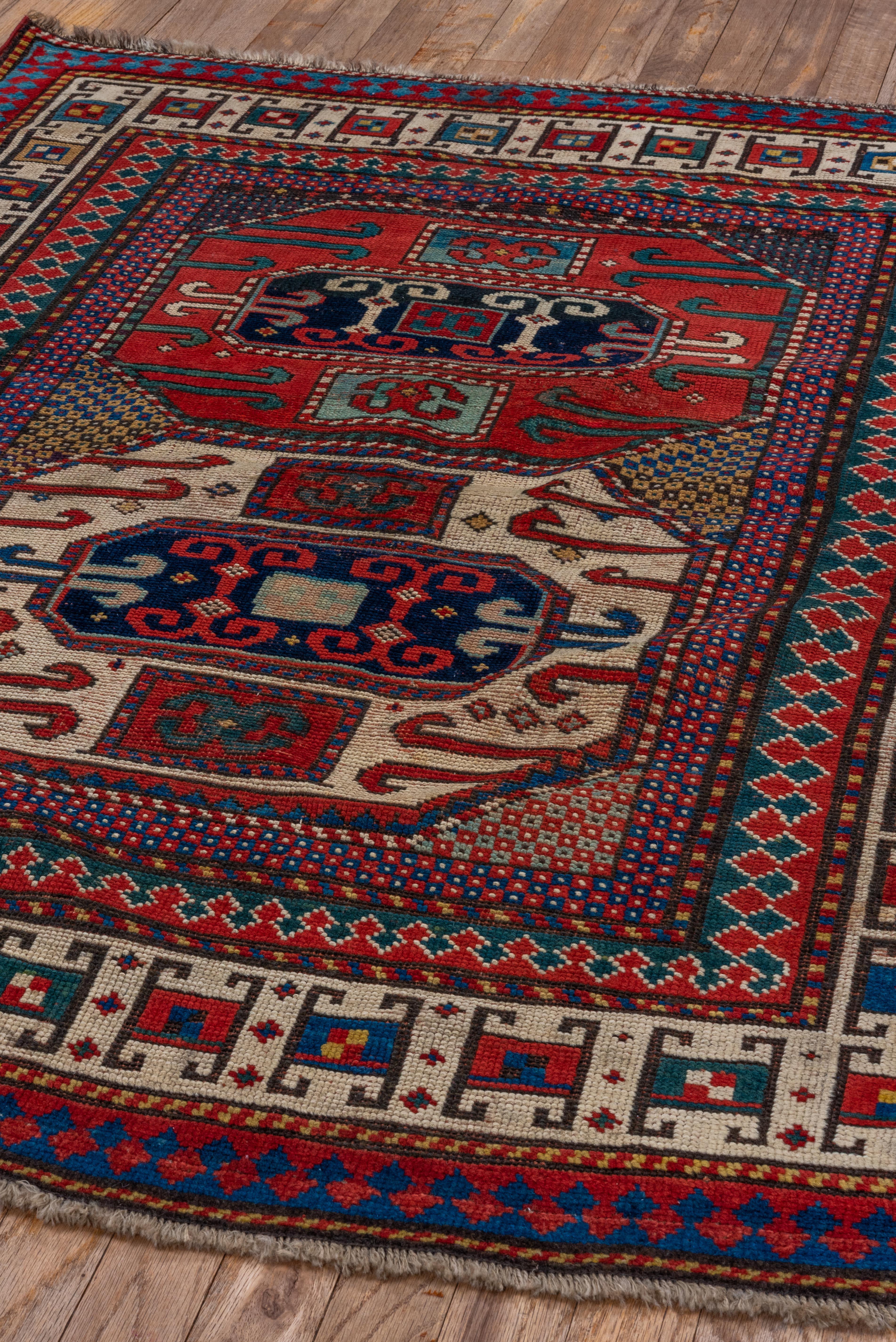 Antique Kazak in Red and Ivory with Tribal Detailing - Circa 1900s For Sale 3