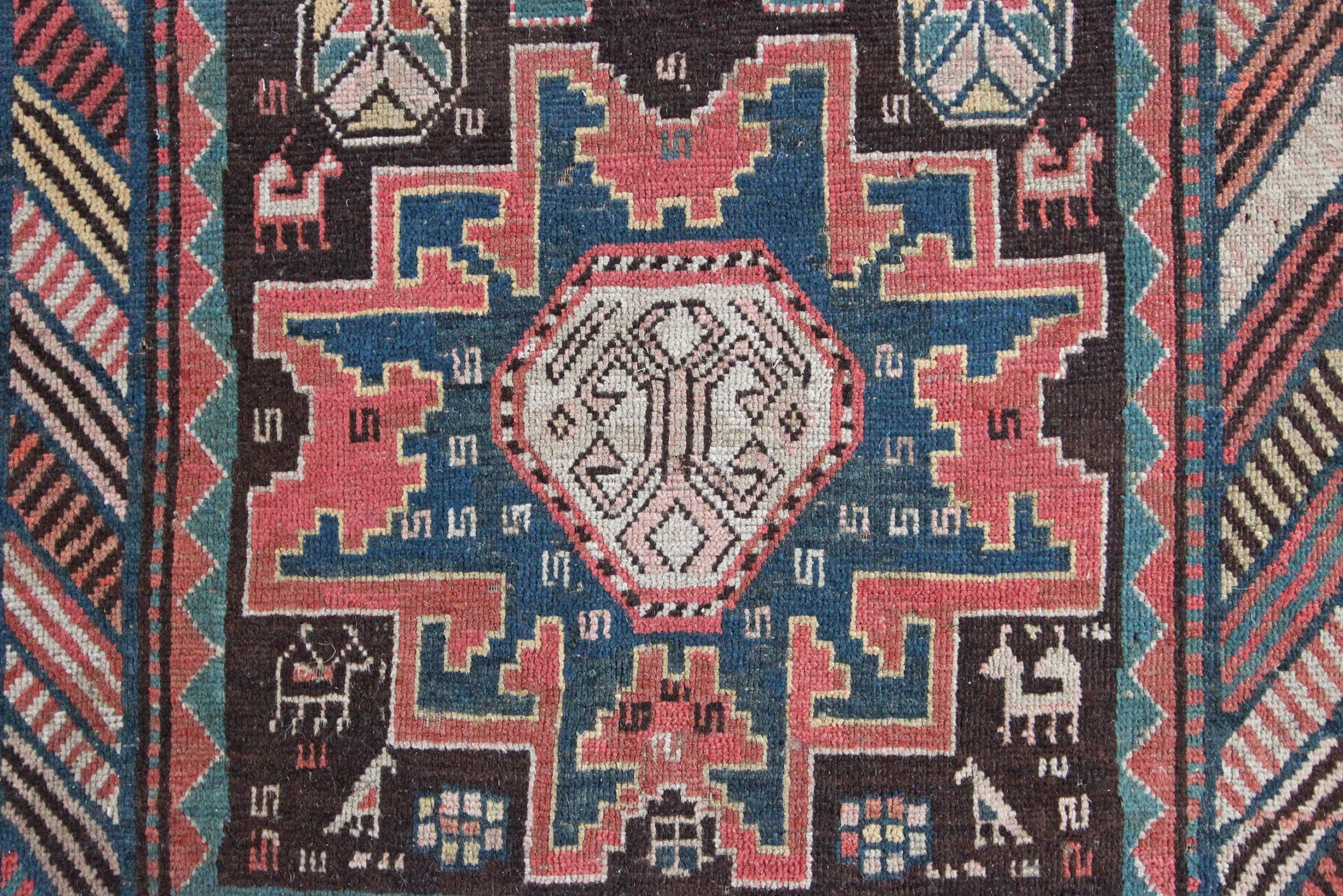 A beautiful soft and decorative antique Kazak kelleh rug, with a five-star design we see in Lesghi Caucasian rugs. Dating from the late 19th century the condition is good with generally a nice wool pile throughout. The fringes are short but no