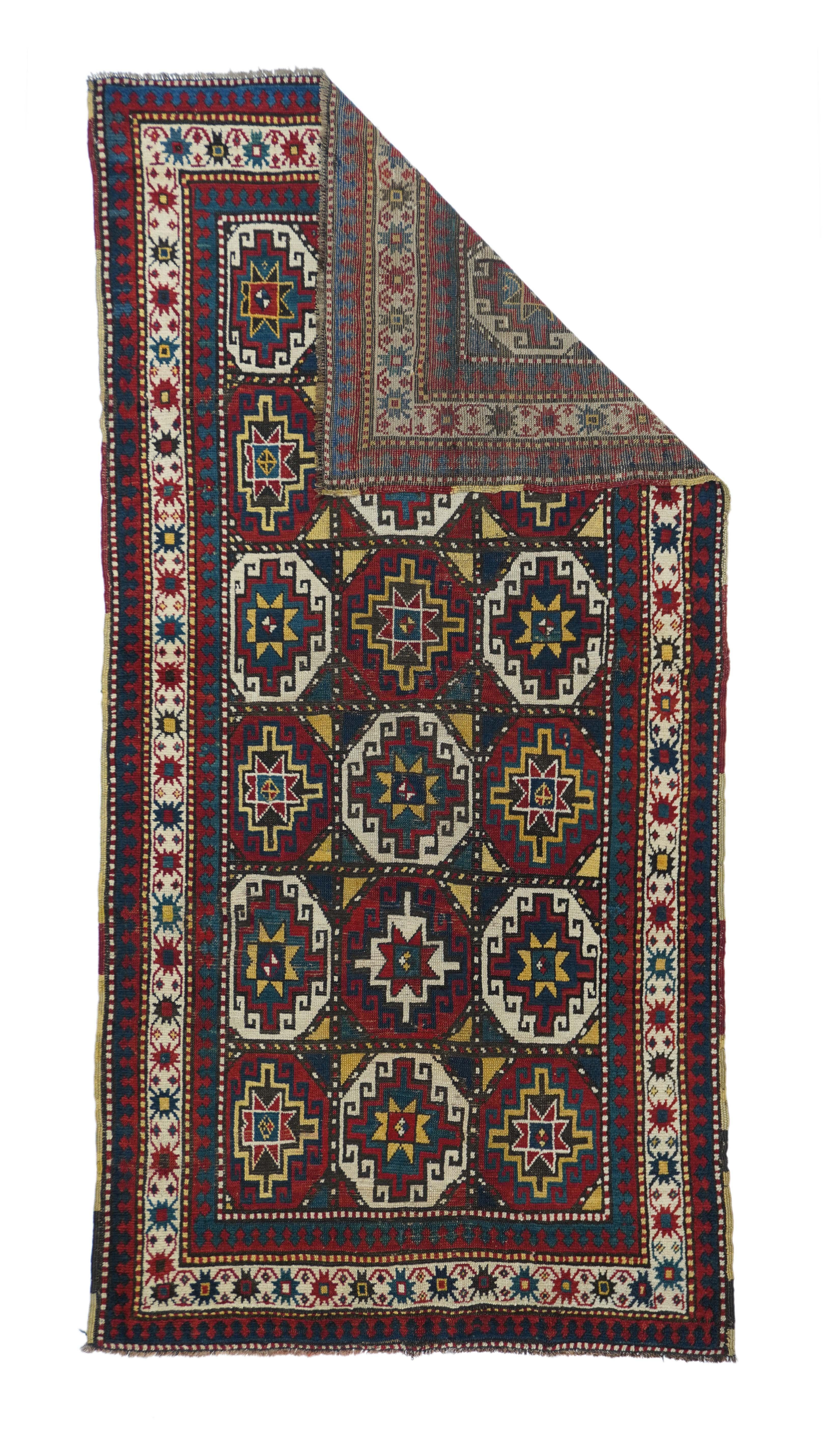 Antique Kazak rug measures: 4' x 7'8''. Three more or less complete columns of seven boxed 'Memling guls