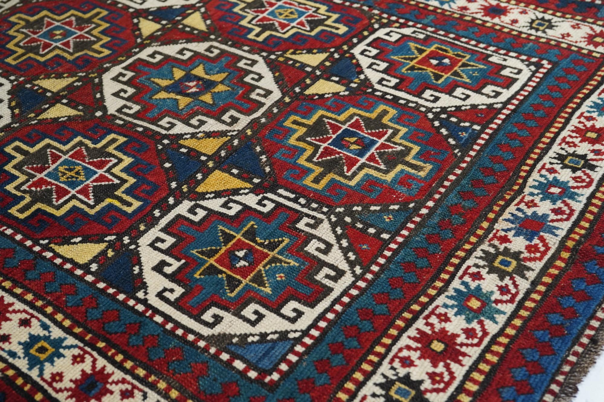 Wool Antique Kazak Rug For Sale