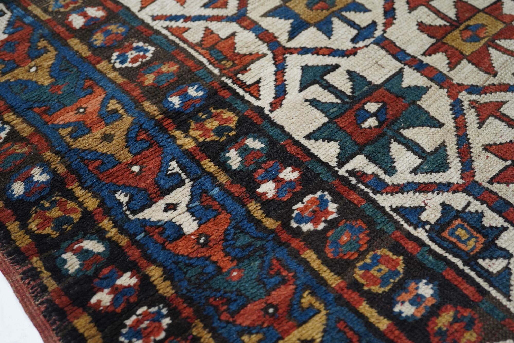 Tapis Kazak ancien 4'0