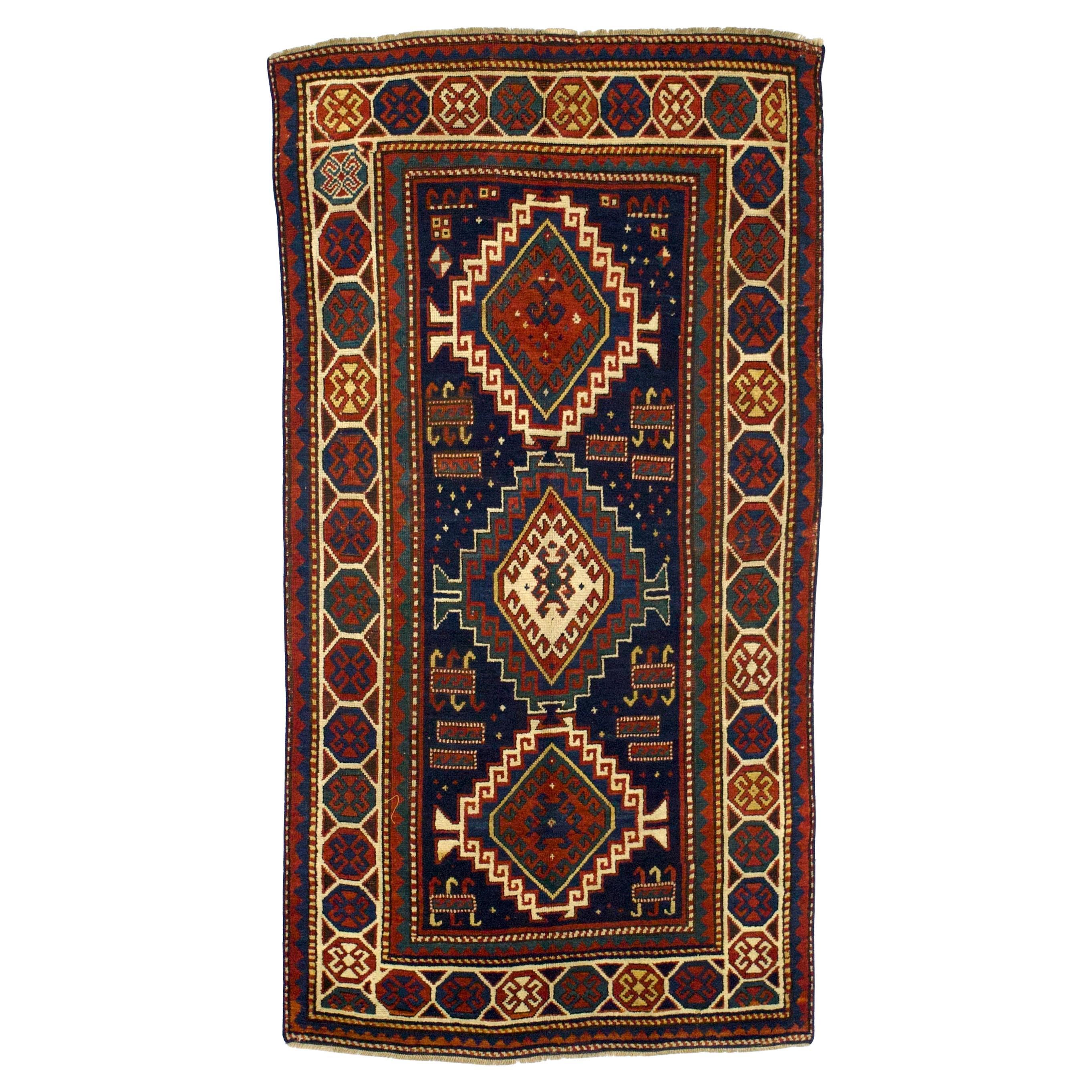 Antique Kazak Rug 4’2" x 7’8”