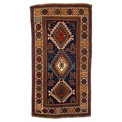 Tappeto Kazak antico 4'2" x 7'8"