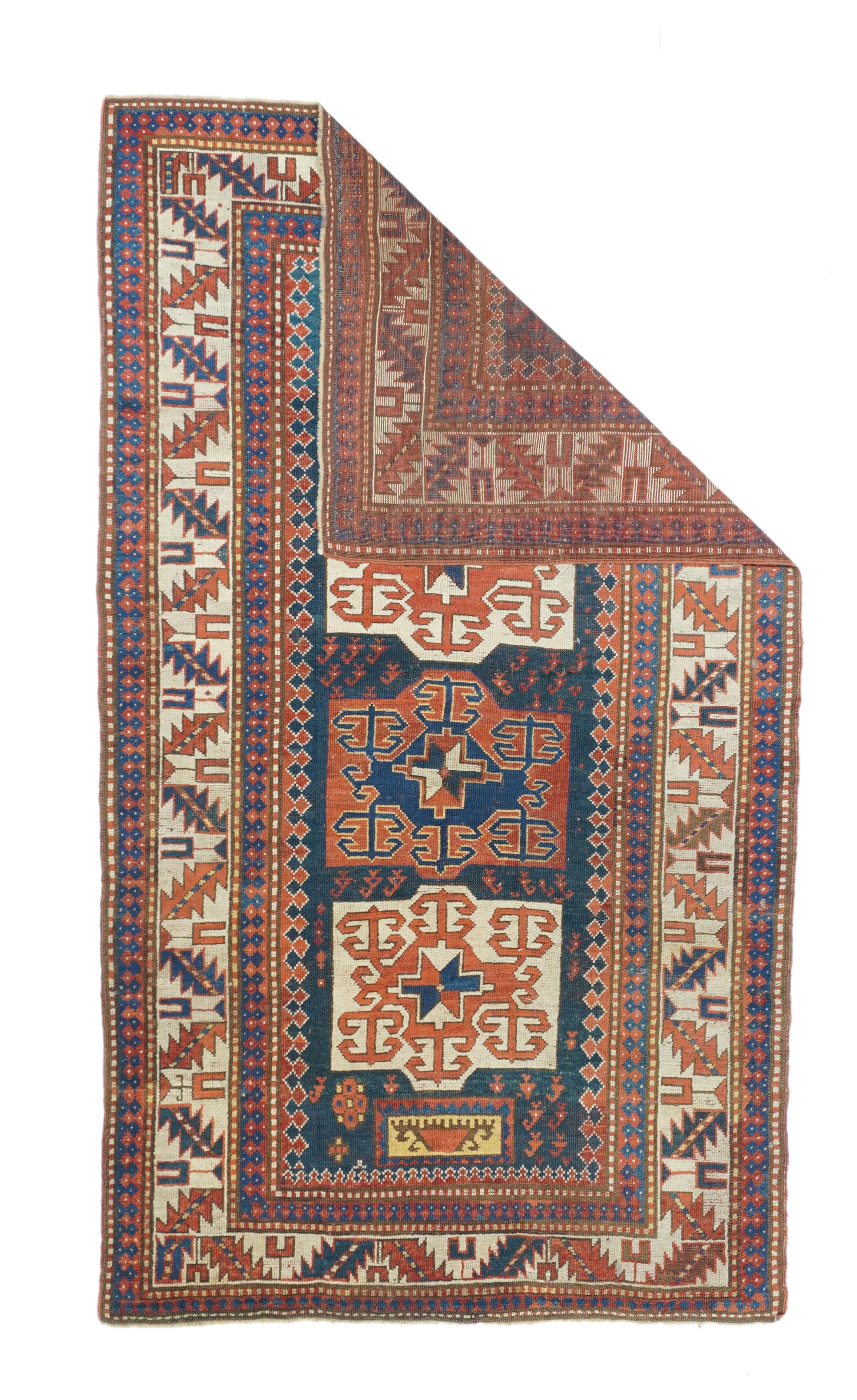 Antique Kazak rug measures 4'5'' x 7'8''.