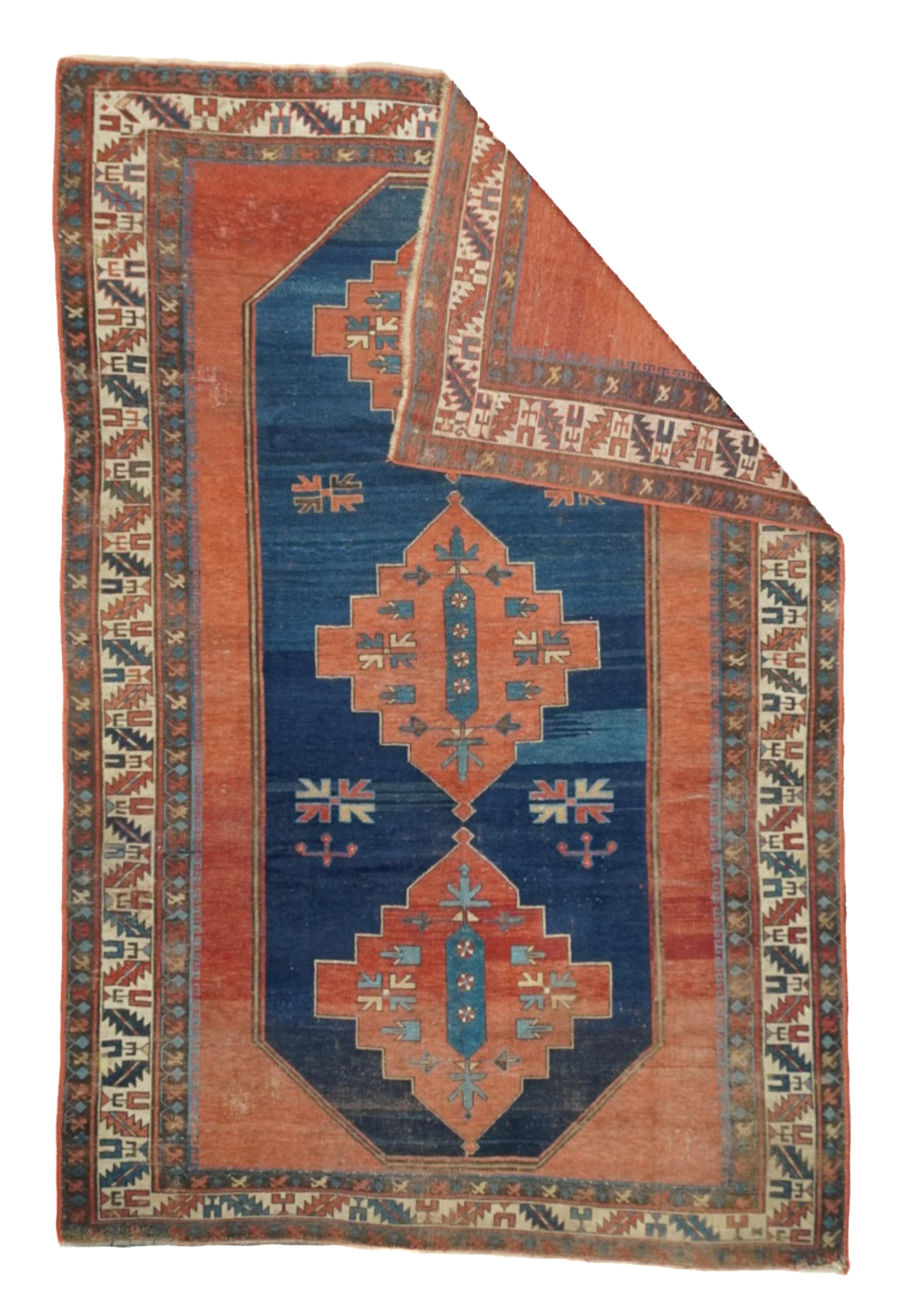Tappeto Kazak antico 5'8'' x 8'6''.  Caucaso occidentale/Armenia. Motivi audaci, colori intensi, totalmente geometrici, interamente in lana, a trama da grossa a moderata, a vello medio o lungo, in formato sparso, con layout a medaglione, allover e a
