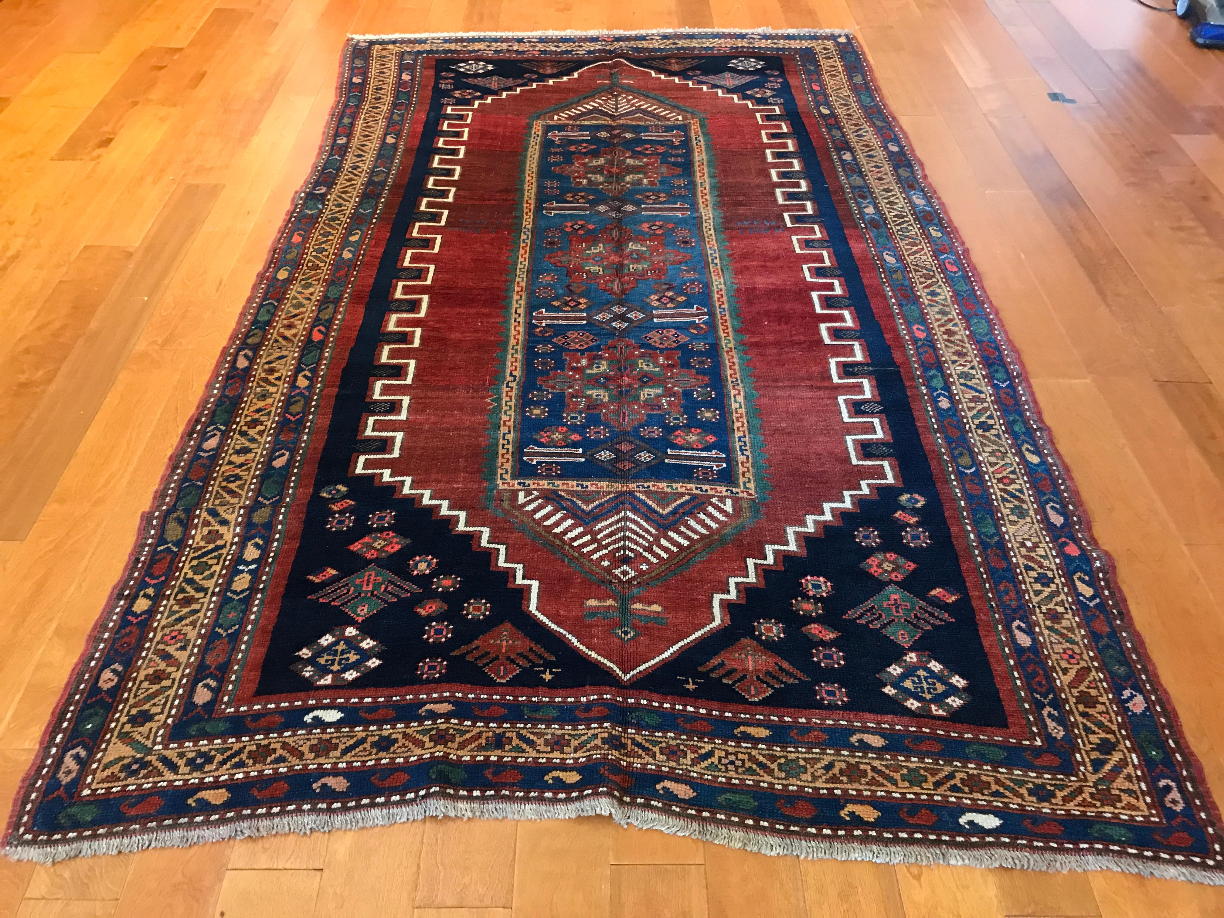 Antique Kazak rug. Measures: 5'4