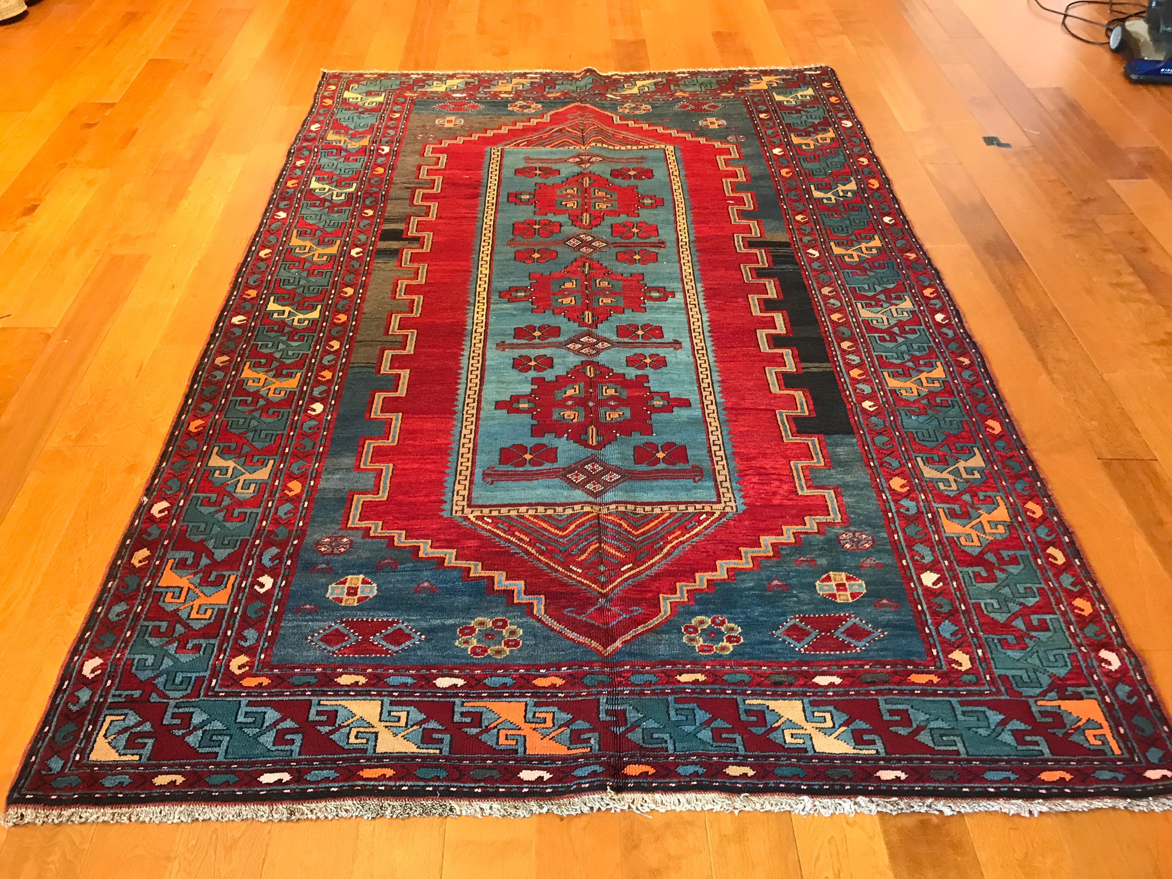 Antique Kazak rug. Measures: 5'7