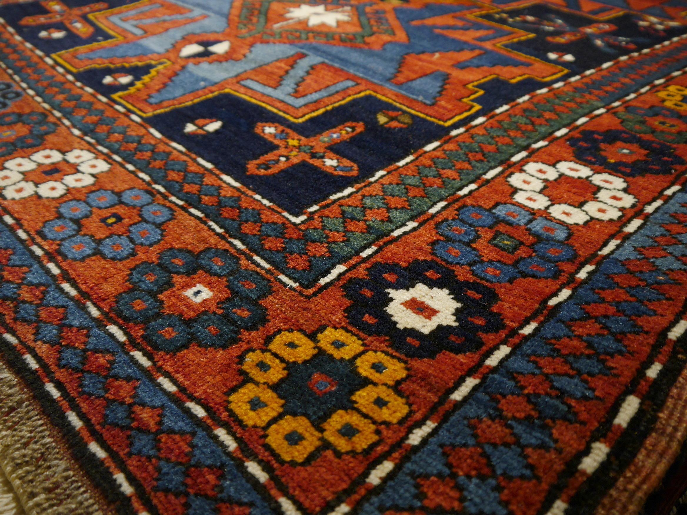 Hand-Knotted Antique Kazak Rug Hand Knotted in Azerbaijan with Vegetable Dyes 