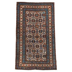 Antique Kazak Rug with Bold Geometric Lattice