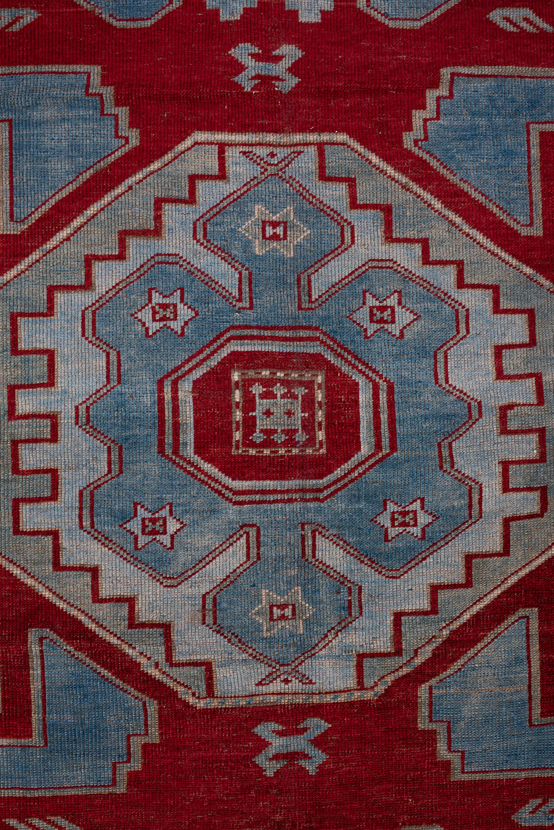 Hand-Knotted Antique Kazak Rug with Bold Red Border and Blue Field