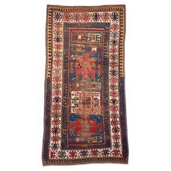 Antique Kazak Rug with Iconic Fence of Protection Perimeter, c. 1920-30's
