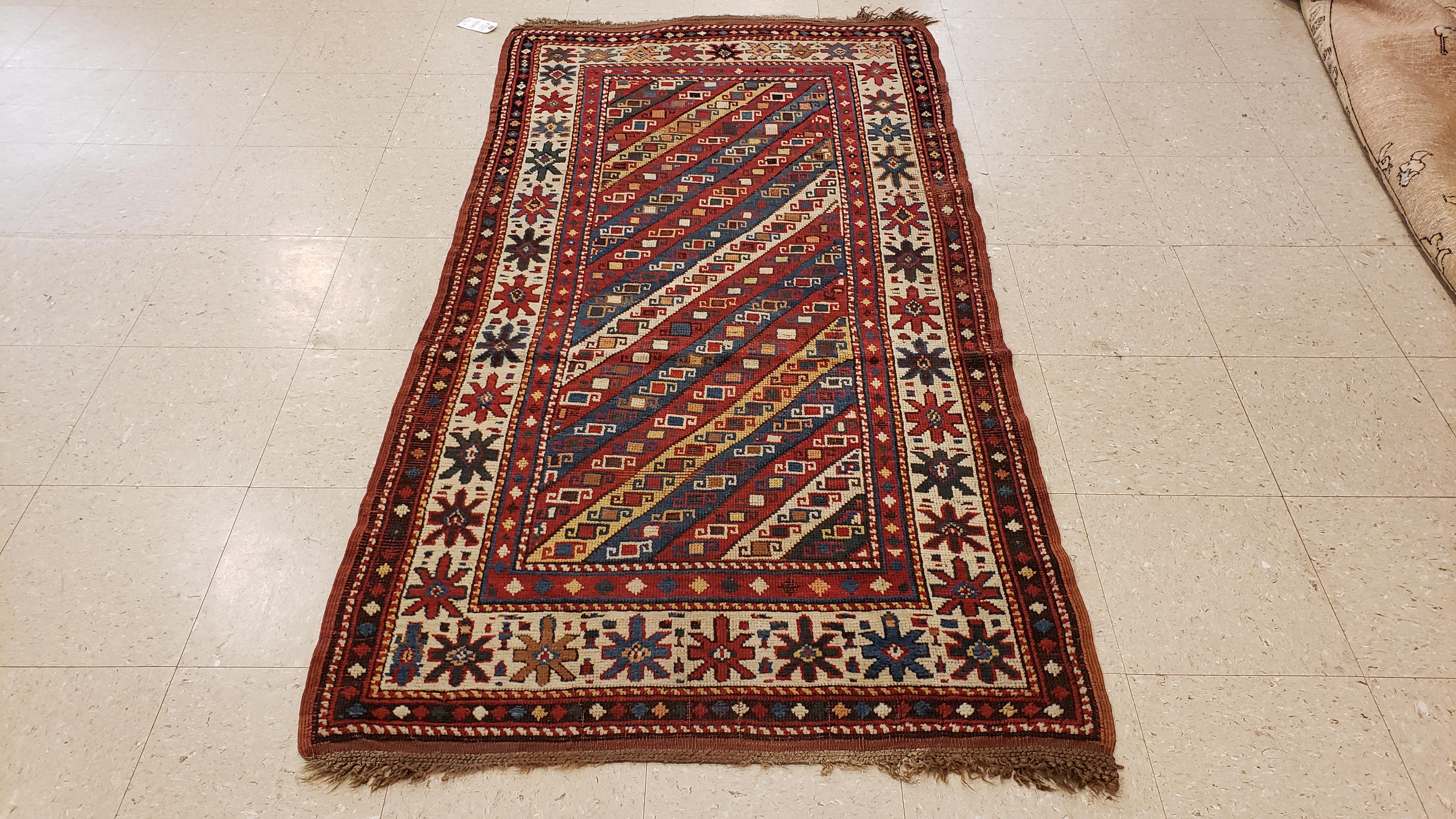 Antique Kazak Runner, Handmade Oriental Rug, Red, Blue, Yellow, Off-White, Green In Excellent Condition For Sale In Port Washington, NY