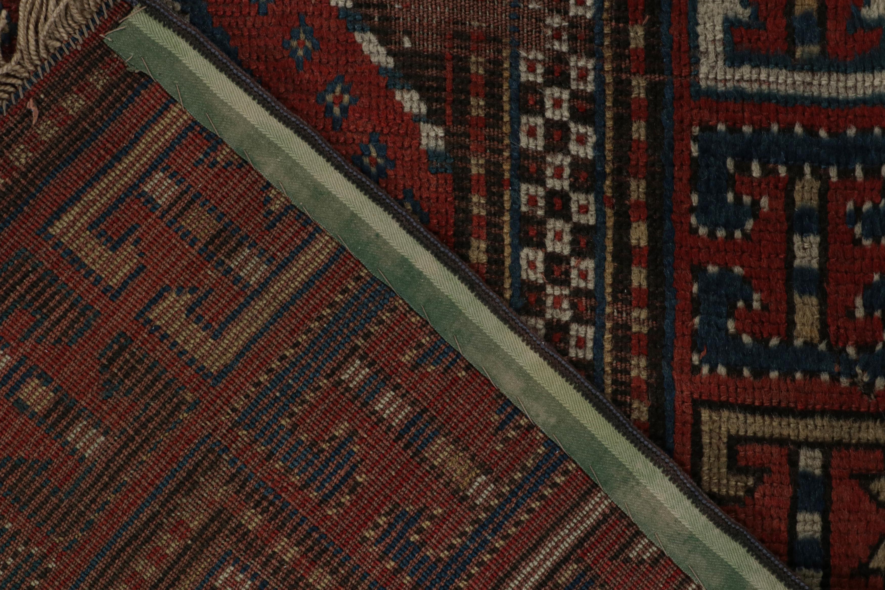 Early 20th Century Antique Kazak Runner Rug with Red & Blue Geometric Patterns, from Rug & Kilim For Sale