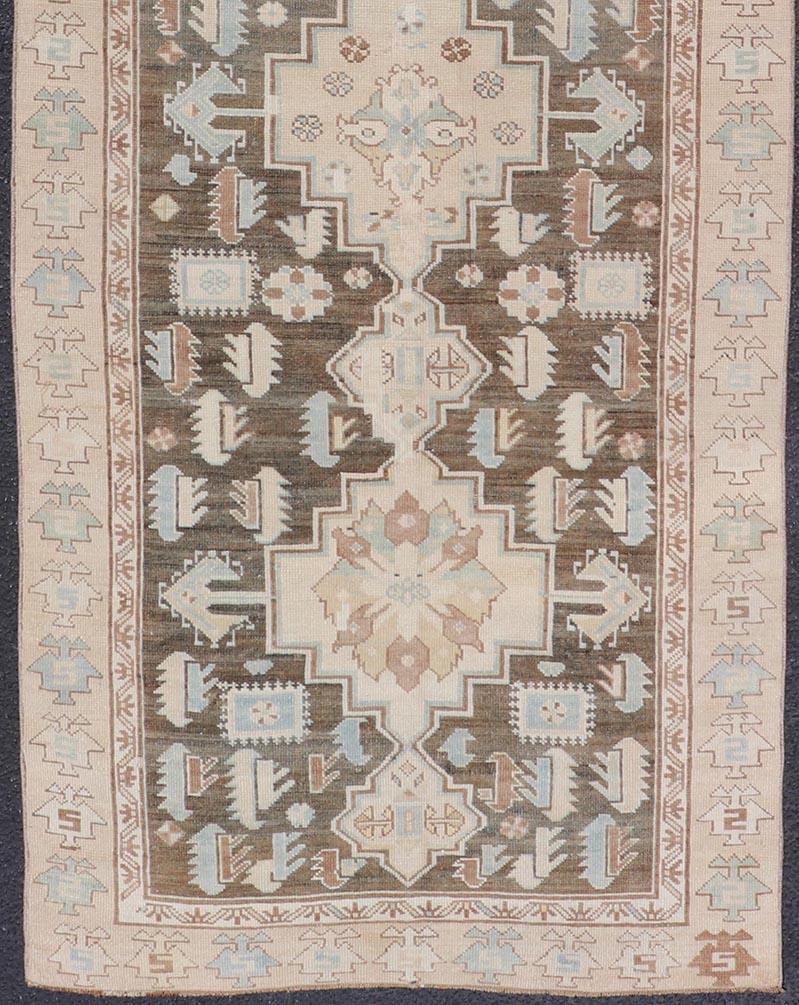 Caucasian Antique Kazak Runner with Geometric Design and Medallions on a Brown Field