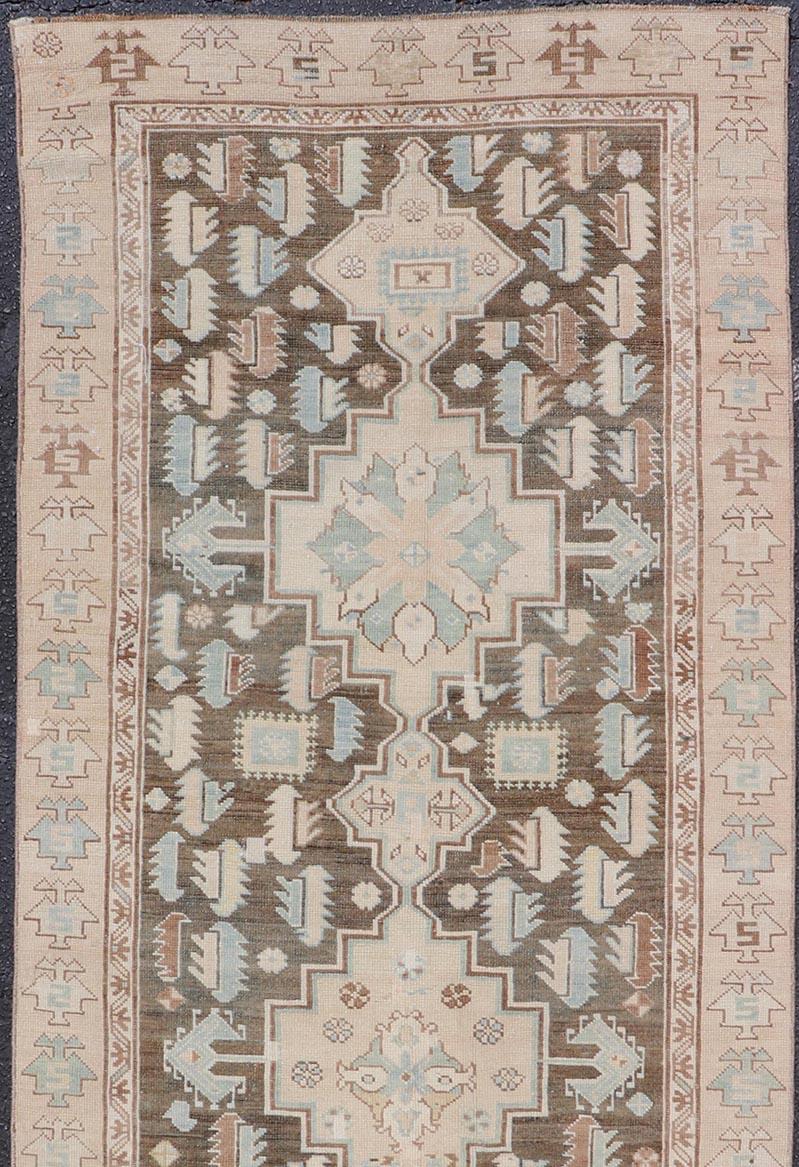Hand-Knotted Antique Kazak Runner with Geometric Design and Medallions on a Brown Field