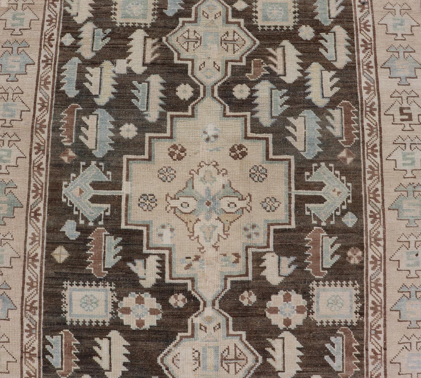 Wool Antique Kazak Runner with Geometric Design and Medallions on a Brown Field