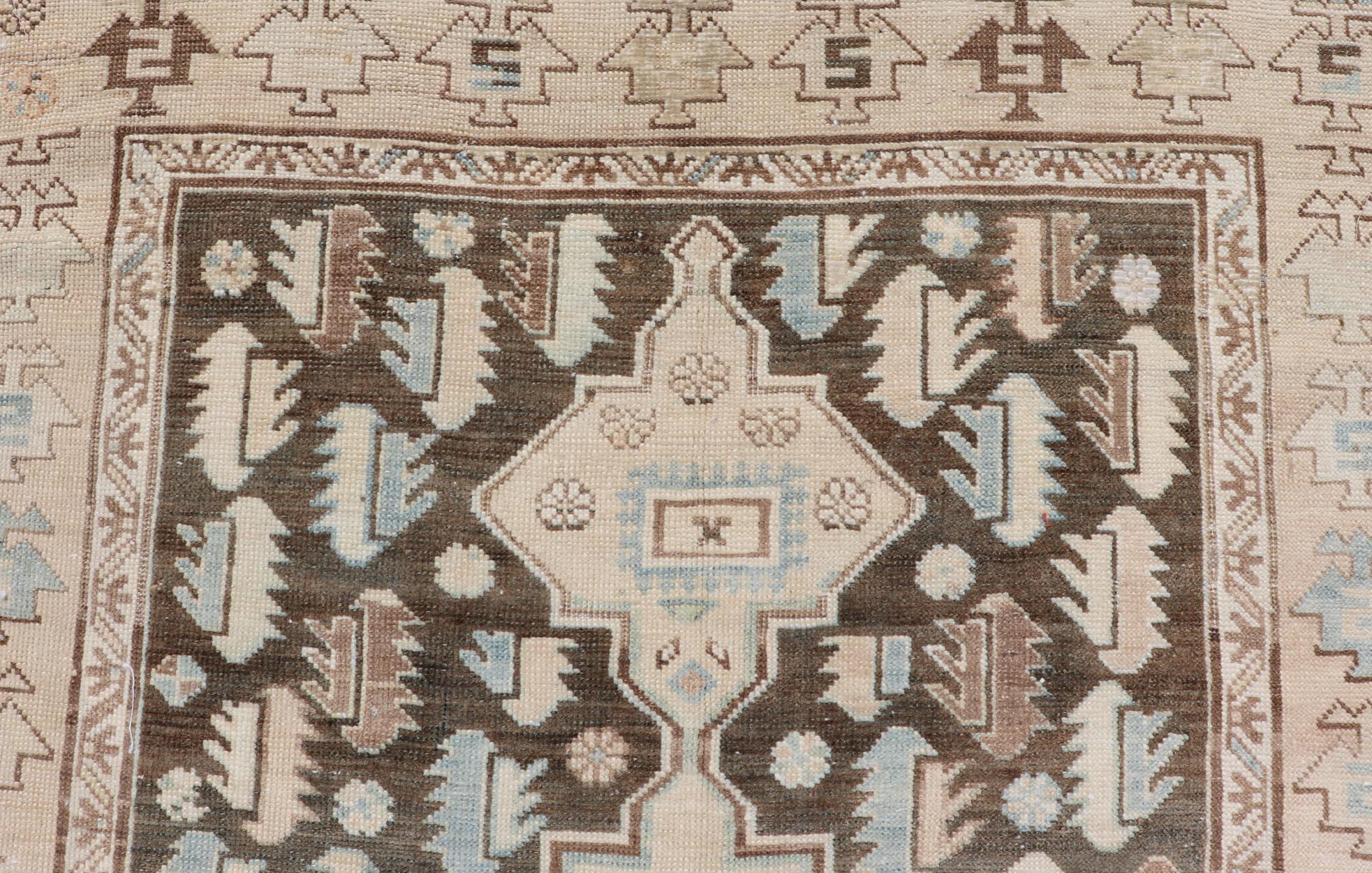 Antique Kazak Runner with Geometric Design and Medallions on a Brown Field 1