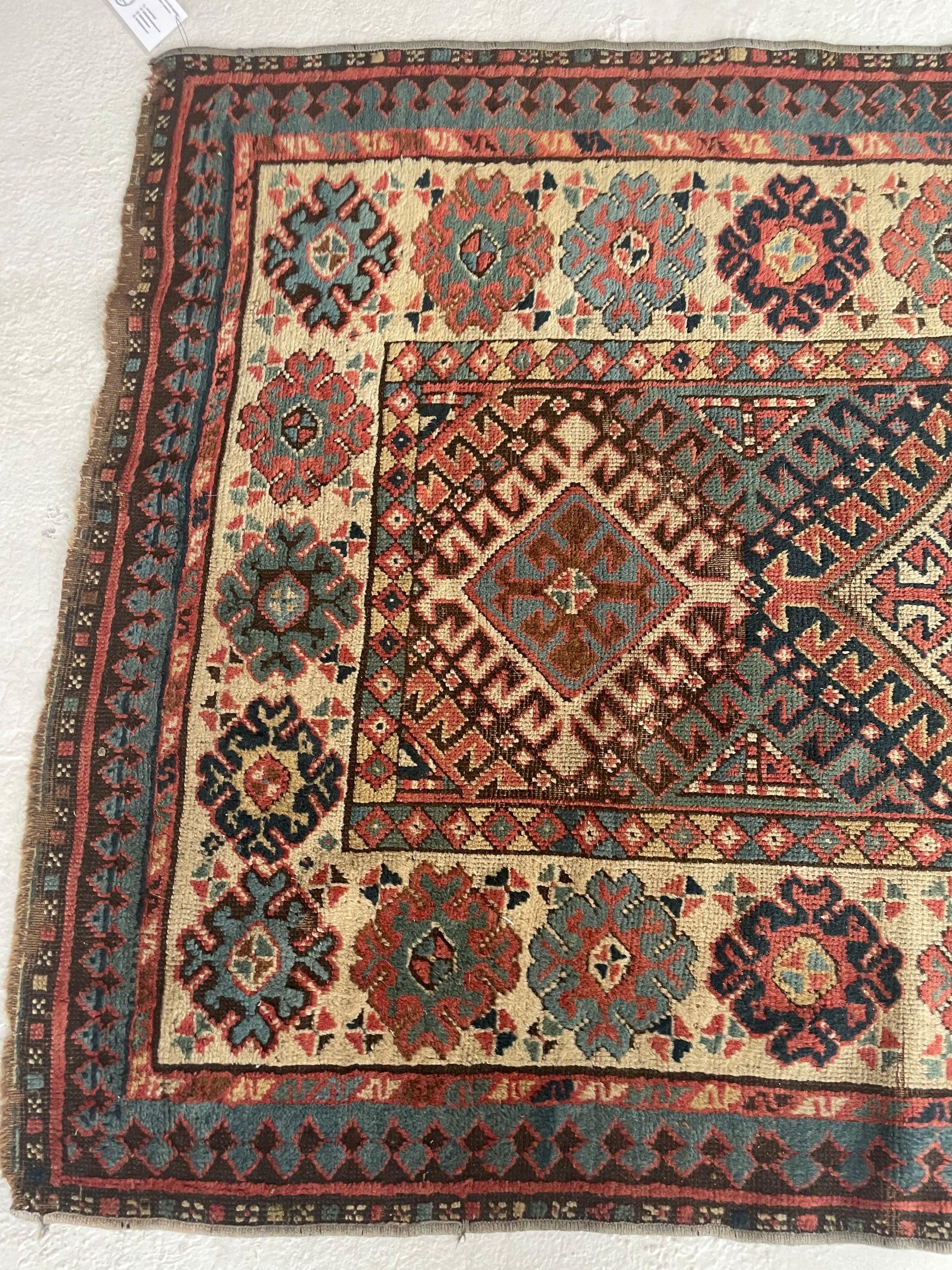 Hand-Knotted Antique Kazak Runner with Mature Dyes & Iconic Design, c. 1920-30's For Sale