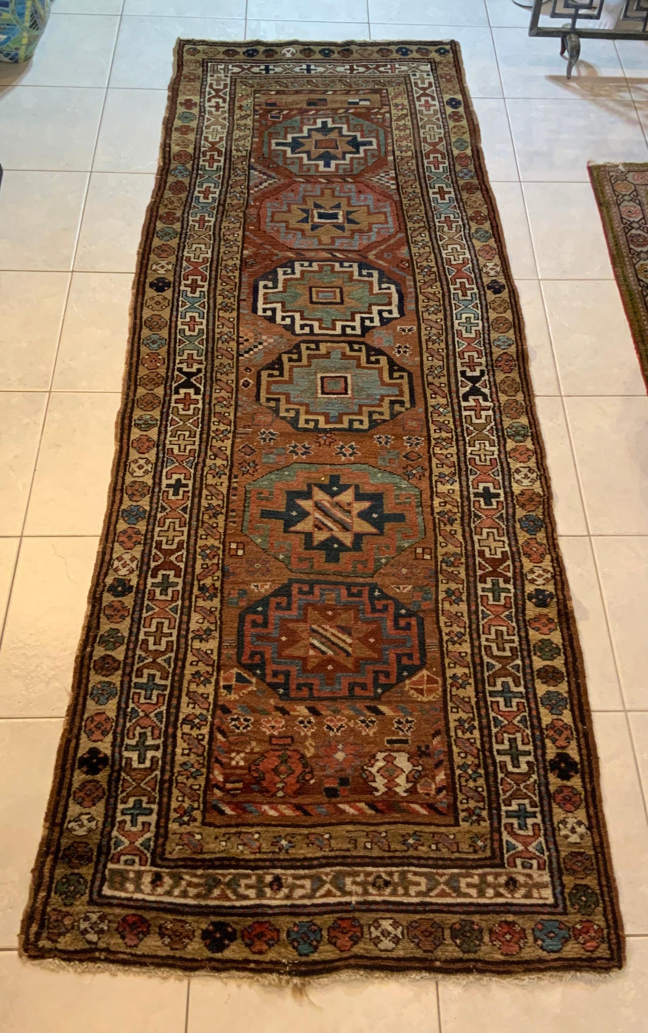Wonderful antique tribal Caucasian Kazak rug handwoven geometric design with beautiful natural colors entirely hand knotted with wool pile, minor professional repair due to age professional washed and cleaned ready to use, one of a kind.