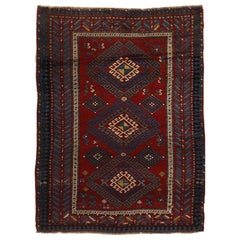 Antique Kazak Transitional Geometric Red and Blue Rug with Dyrnak Guls