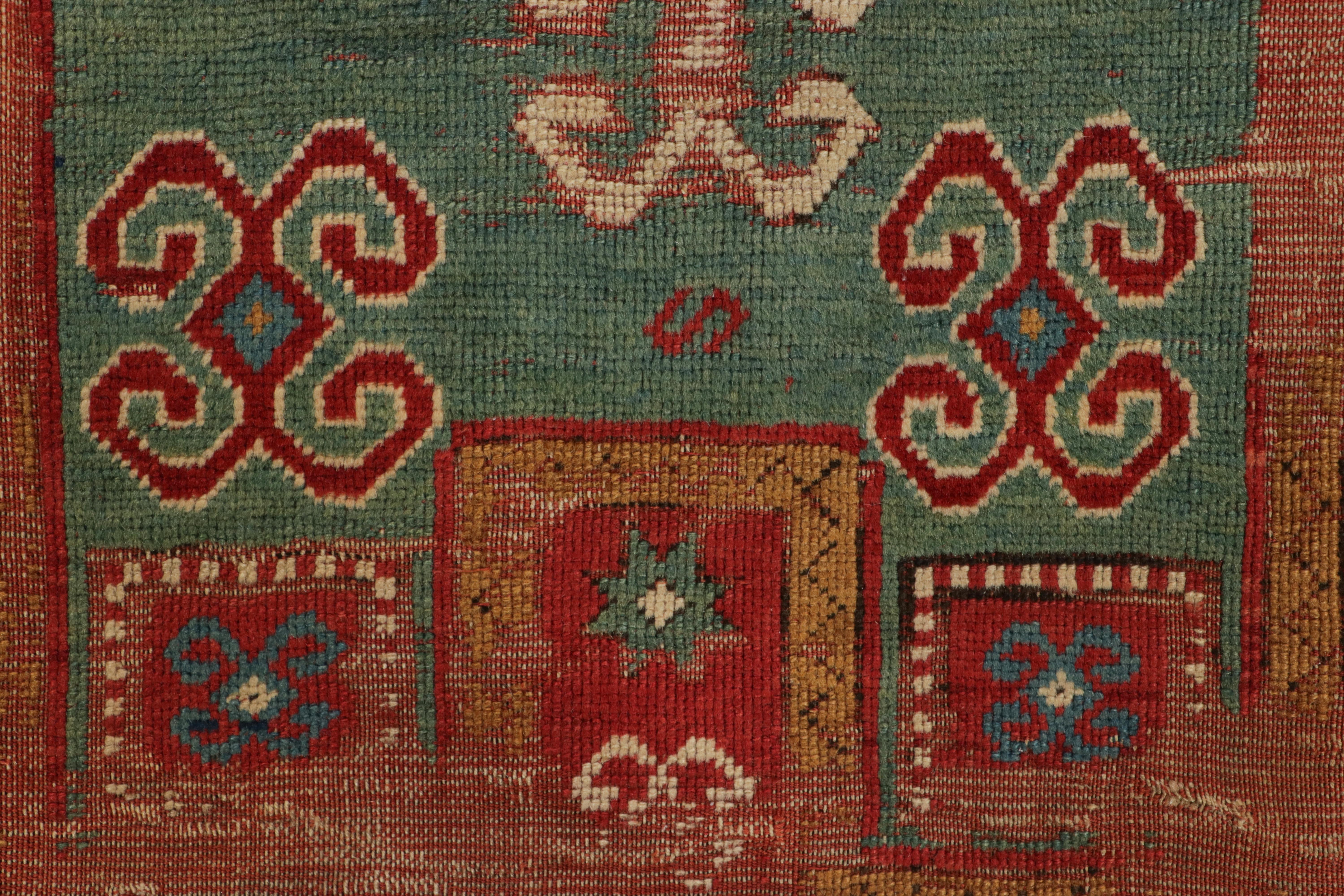 Russo Antico tappeto tribale Kazak, medaglione geometrico rosso e blu - Rug & Kilim in vendita