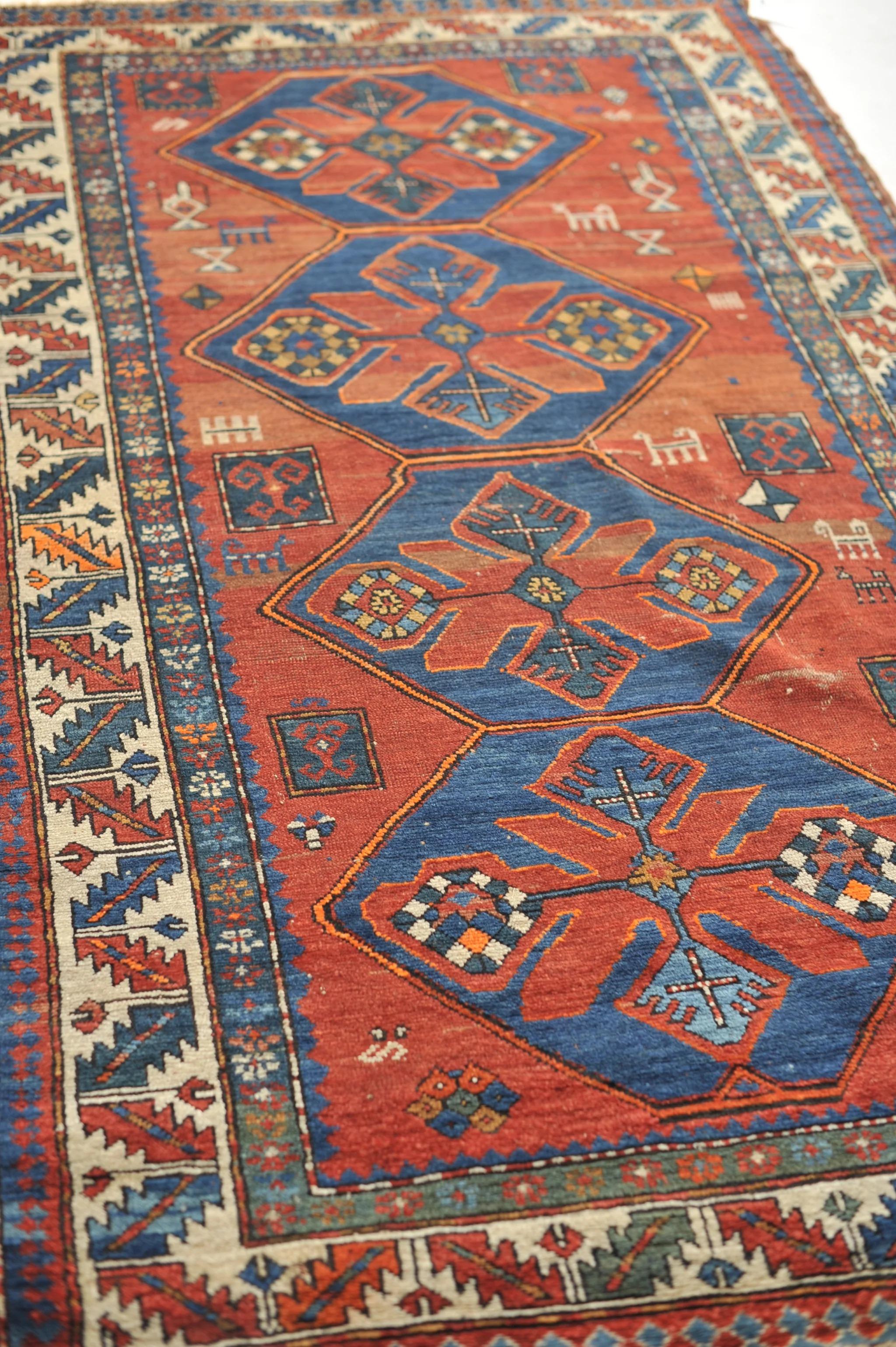 Mid-20th Century Antique Kazak Tribal Rug with Variations of Clay, Rust, Autumn For Sale