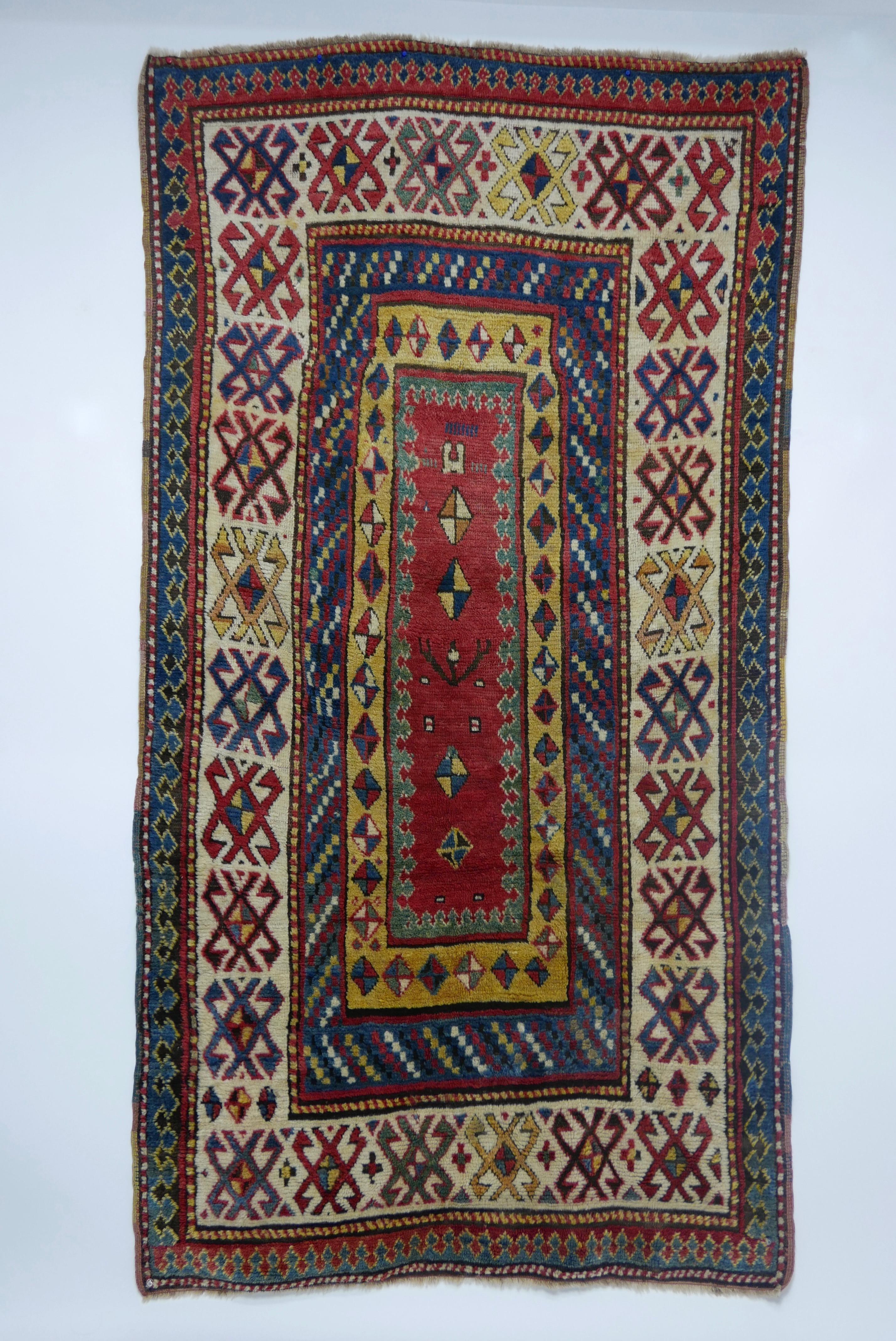 A wool Kazak carpet woven on a wool foundation with all natural dyes,
19th century.
   