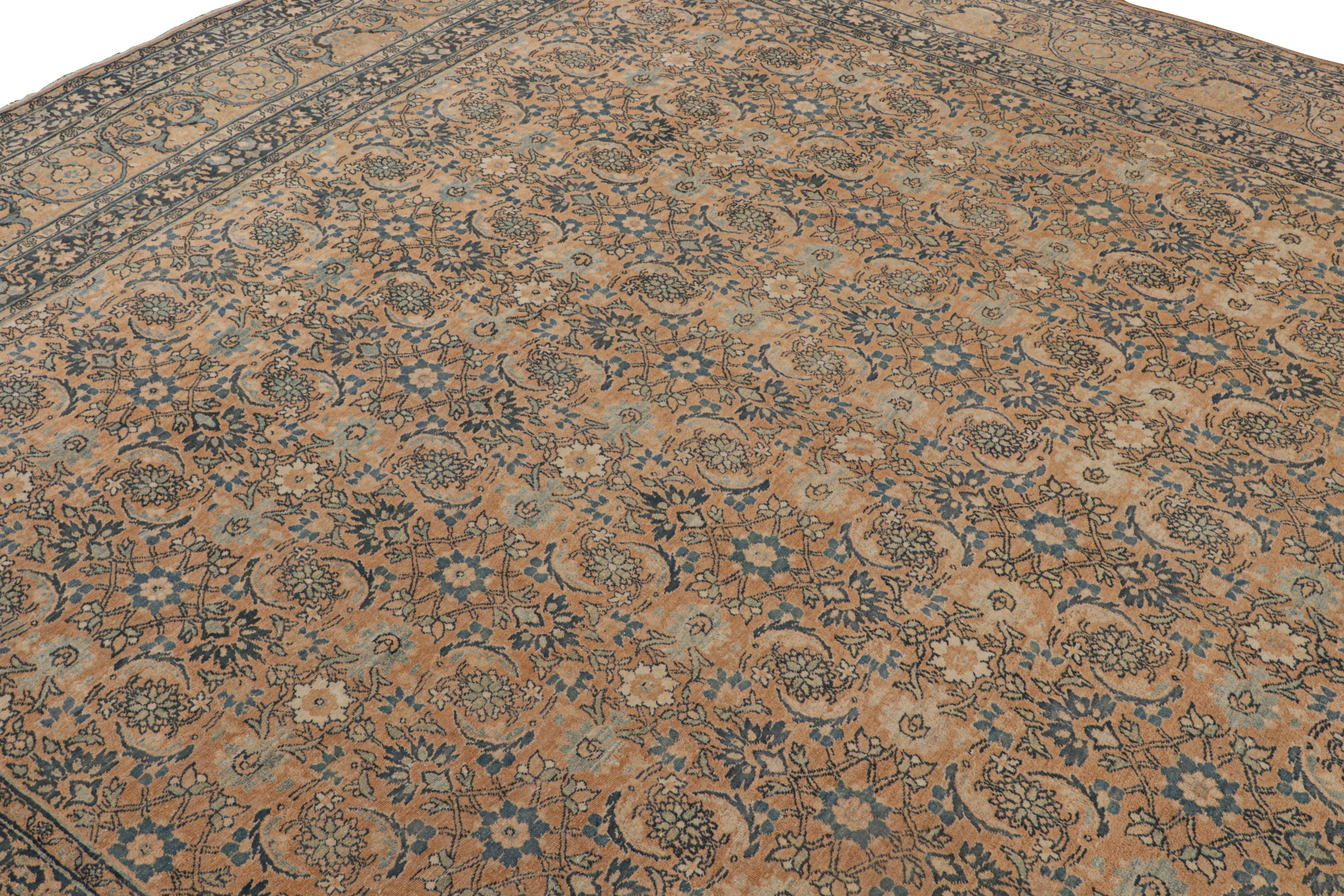 Hand knotted 10x15 beige & brown rug.