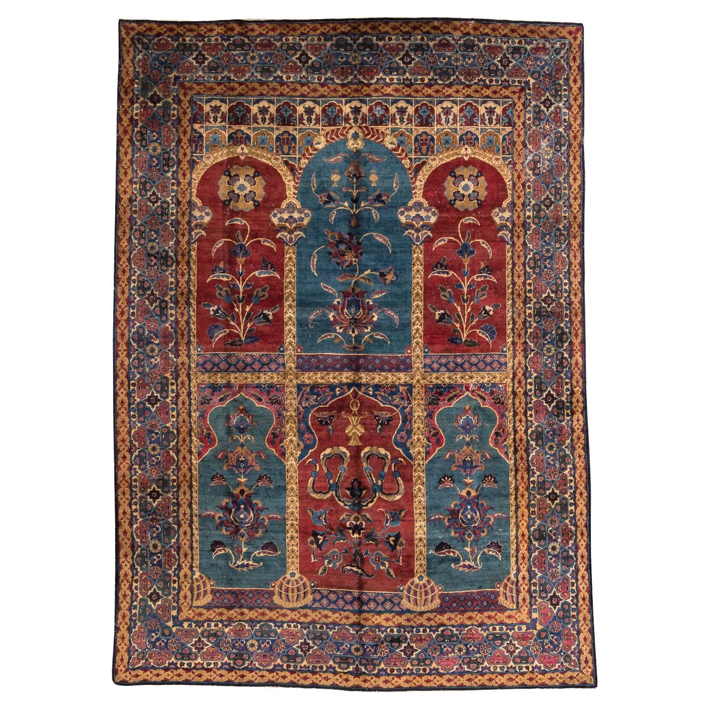 Tapis ancien de Kerman à motifs de panneaux architecturaux en rouge, bleu et or en vente