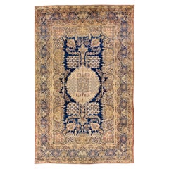Alfombra persa antigua Kerman de lana beige y azul, hecha a mano, con diseño integral
