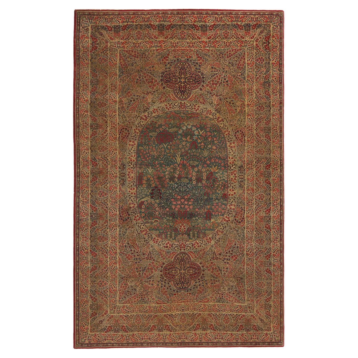 Antiker antiker Kerman Lavar Persischer Teppich aus blauer und roter Wolle von Teppich & Kelim