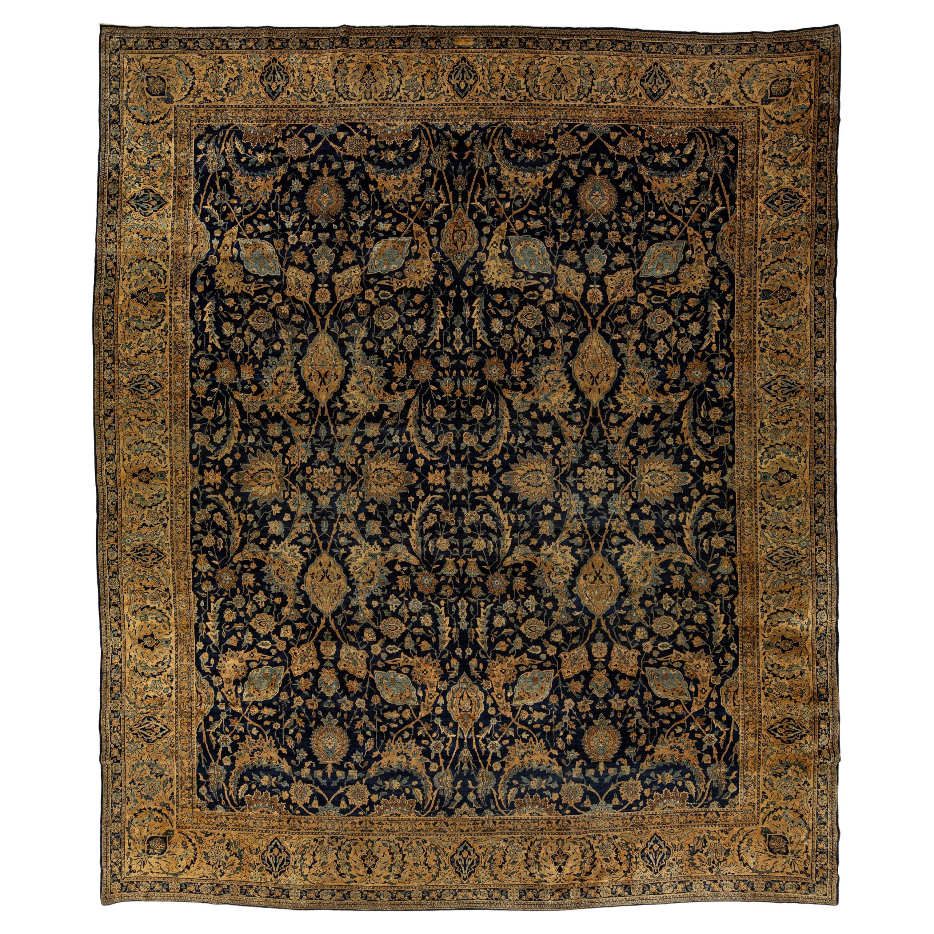 Antique Kerman Persian Oversized Wool Rug in Dark Blue With a Floral Design