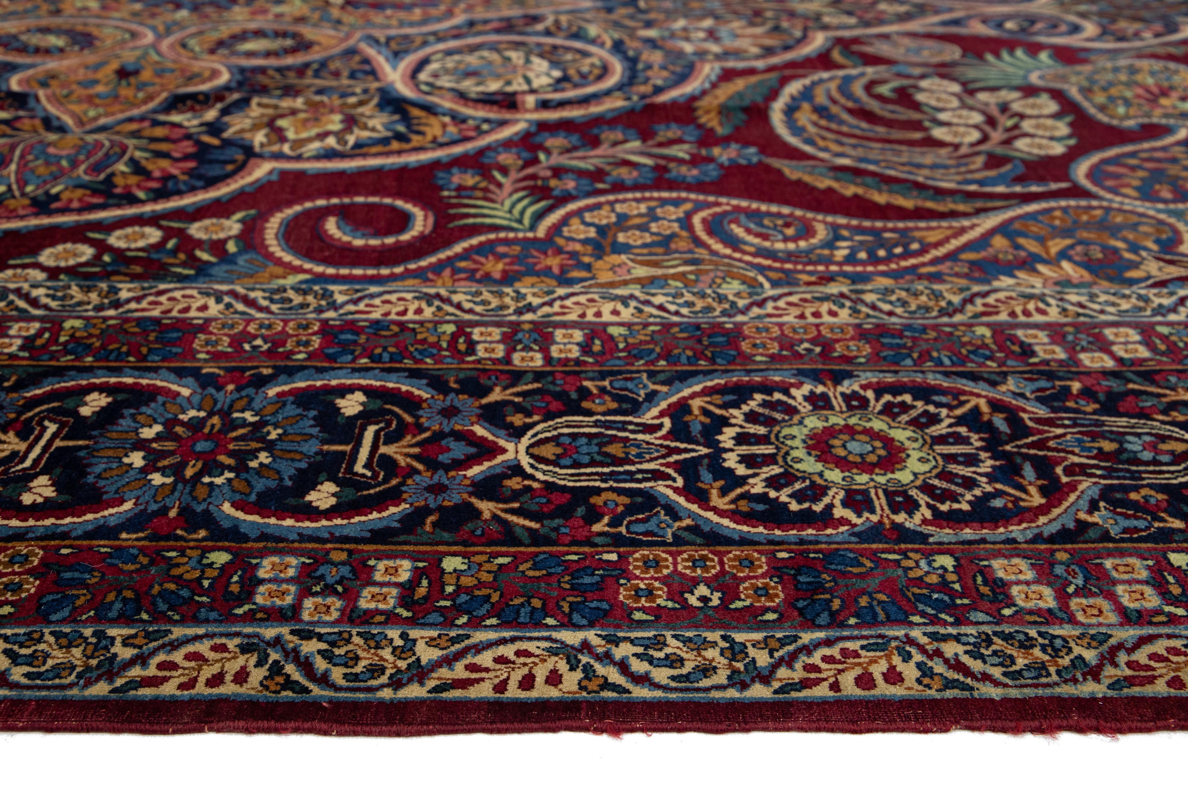 Ancien tapis persan Kerman en laine rouge avec un motif floral multicolore en vente 2