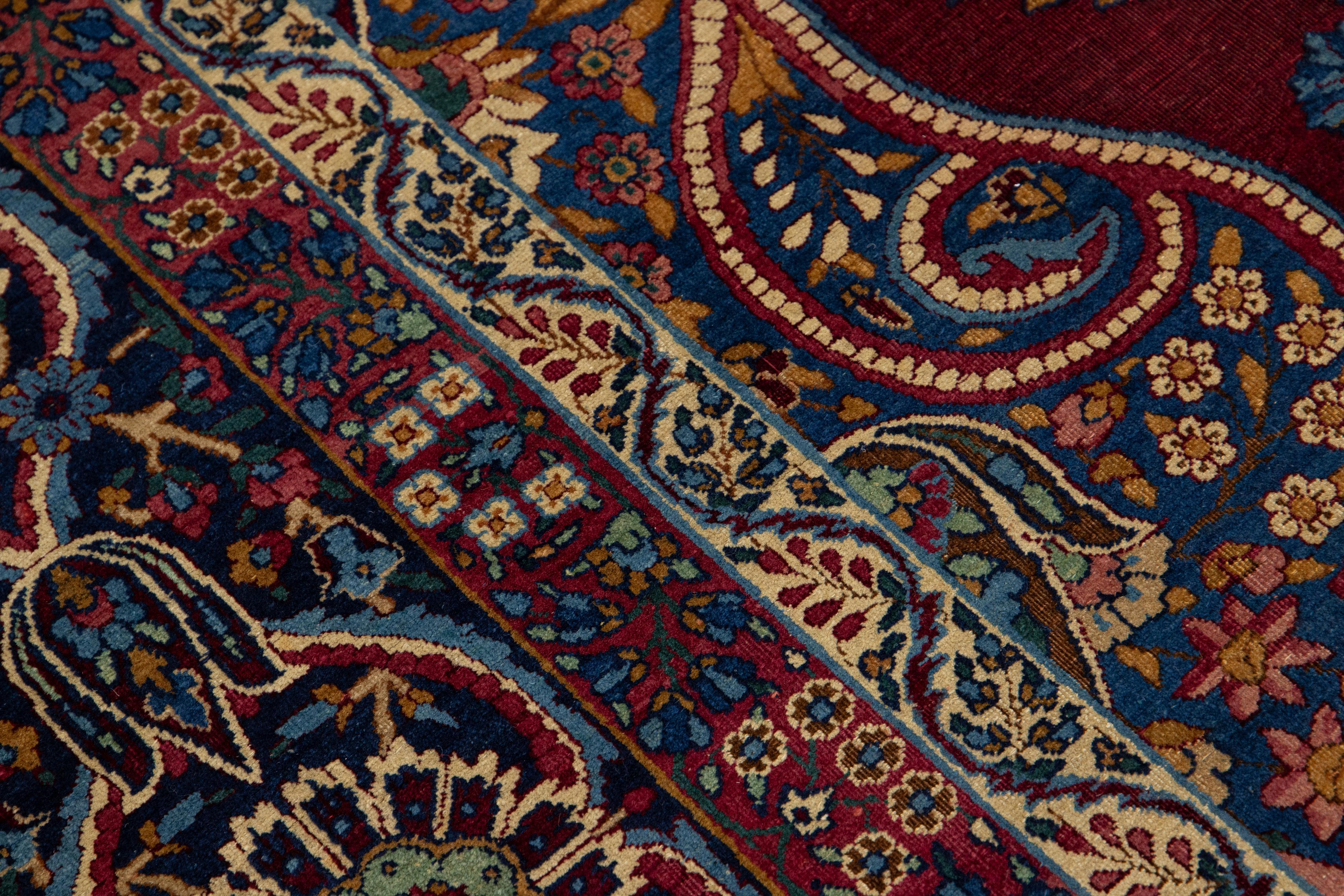 Ancien tapis persan Kerman en laine rouge avec un motif floral multicolore en vente 3