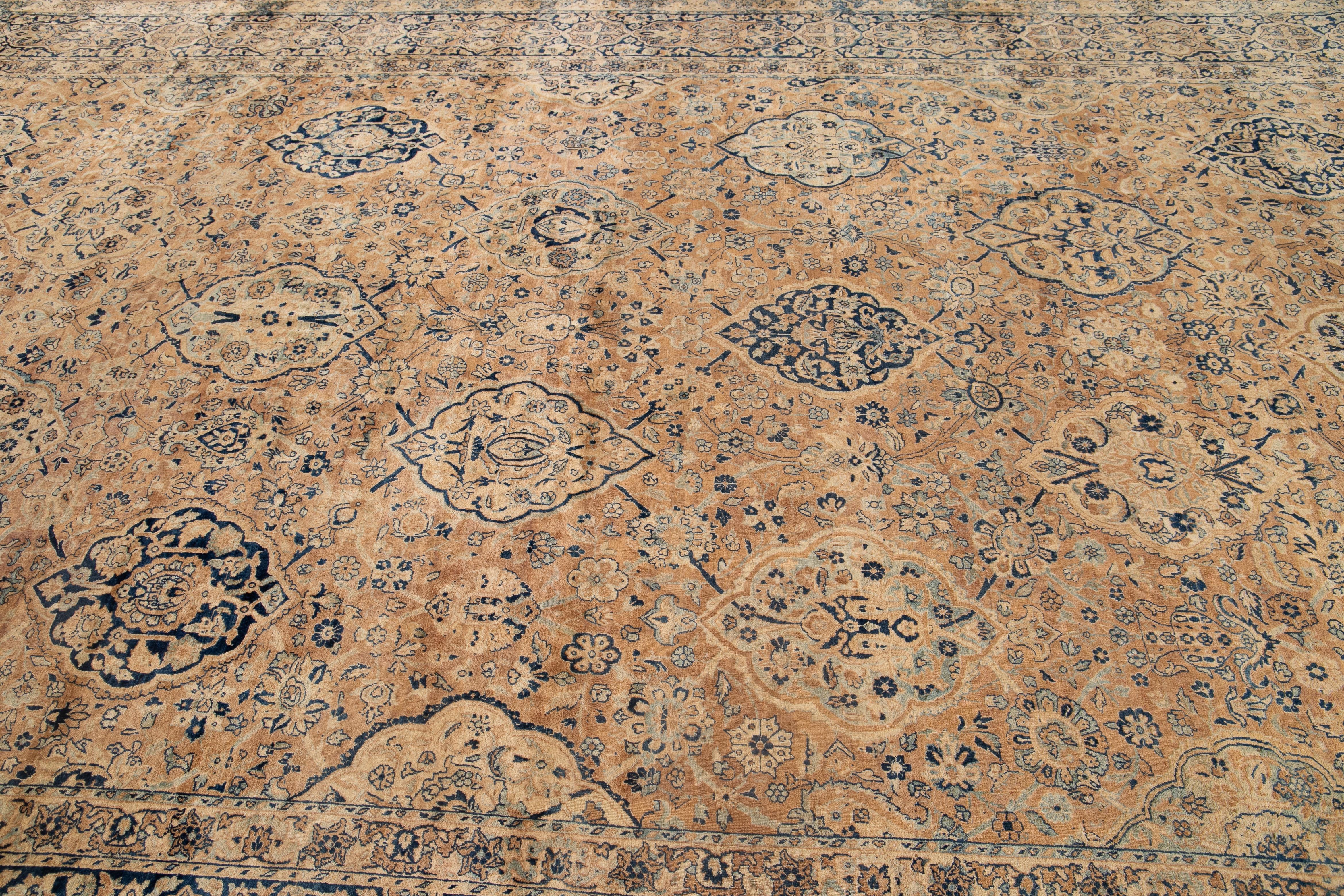 Kirman Antique Kerman Persian Wool Rug in Tan with Alluring Rosette Motif For Sale