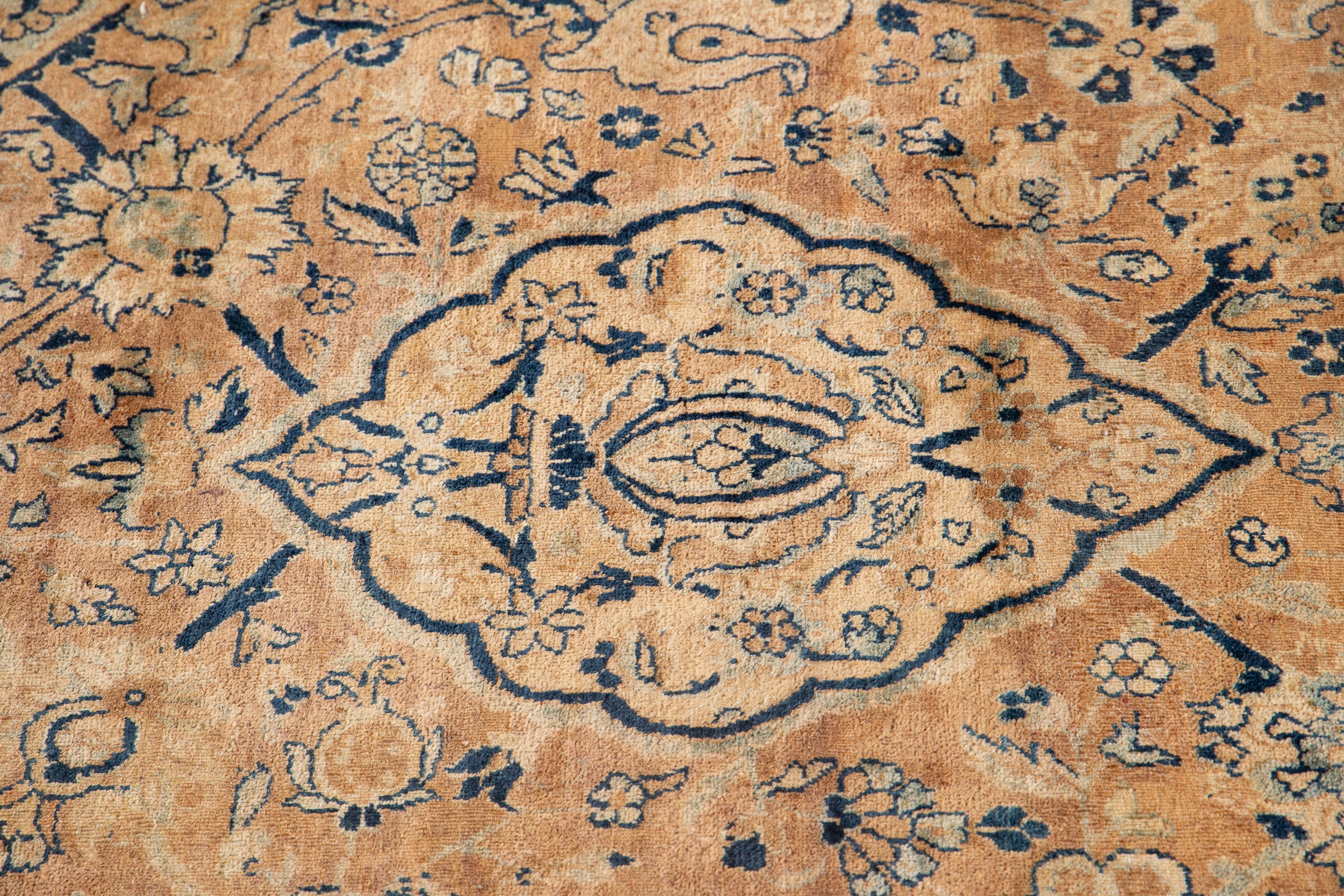 Hand-Knotted Antique Kerman Persian Wool Rug in Tan with Alluring Rosette Motif For Sale