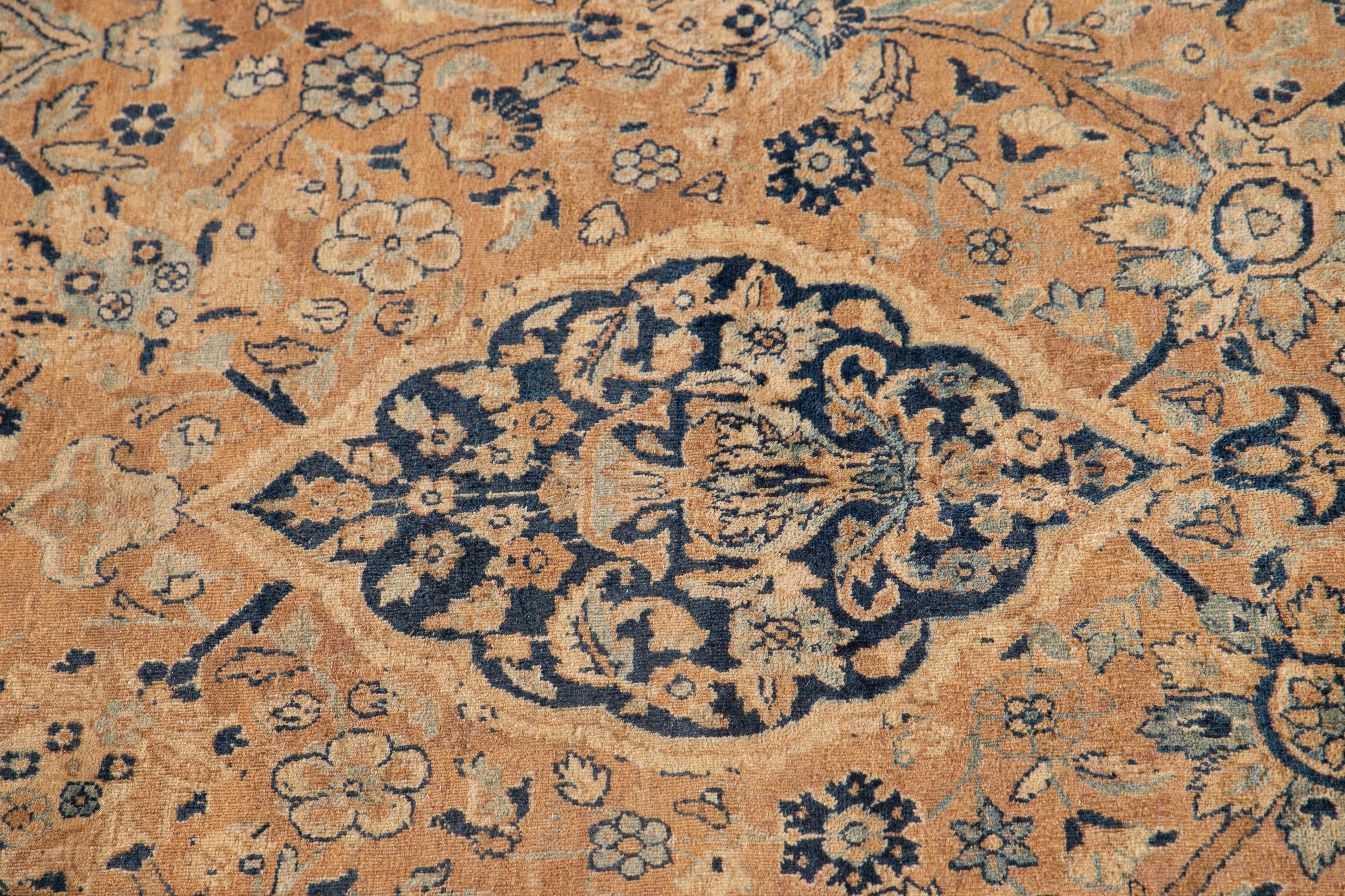 Antique Kerman Persian Wool Rug in Tan with Alluring Rosette Motif In Good Condition For Sale In Norwalk, CT