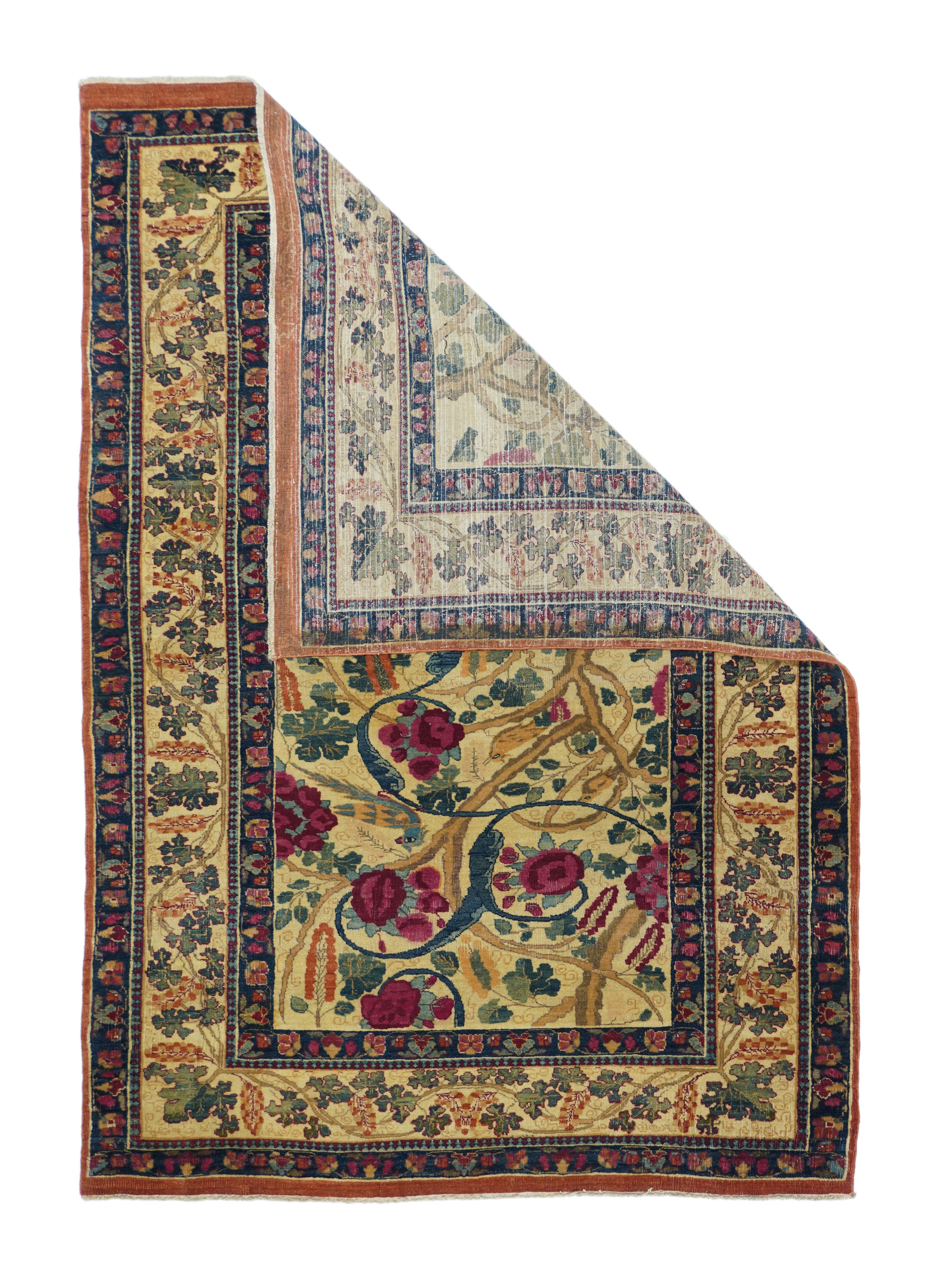 Antique Kerman rug 4' x 5'9''. This very unusual, boldly drawn SE Persian scatter shows a straw ground with a multi-layer arabesque pattern moving diagonally across the field, with a few birds perching bravely amongst the forked arabesques,