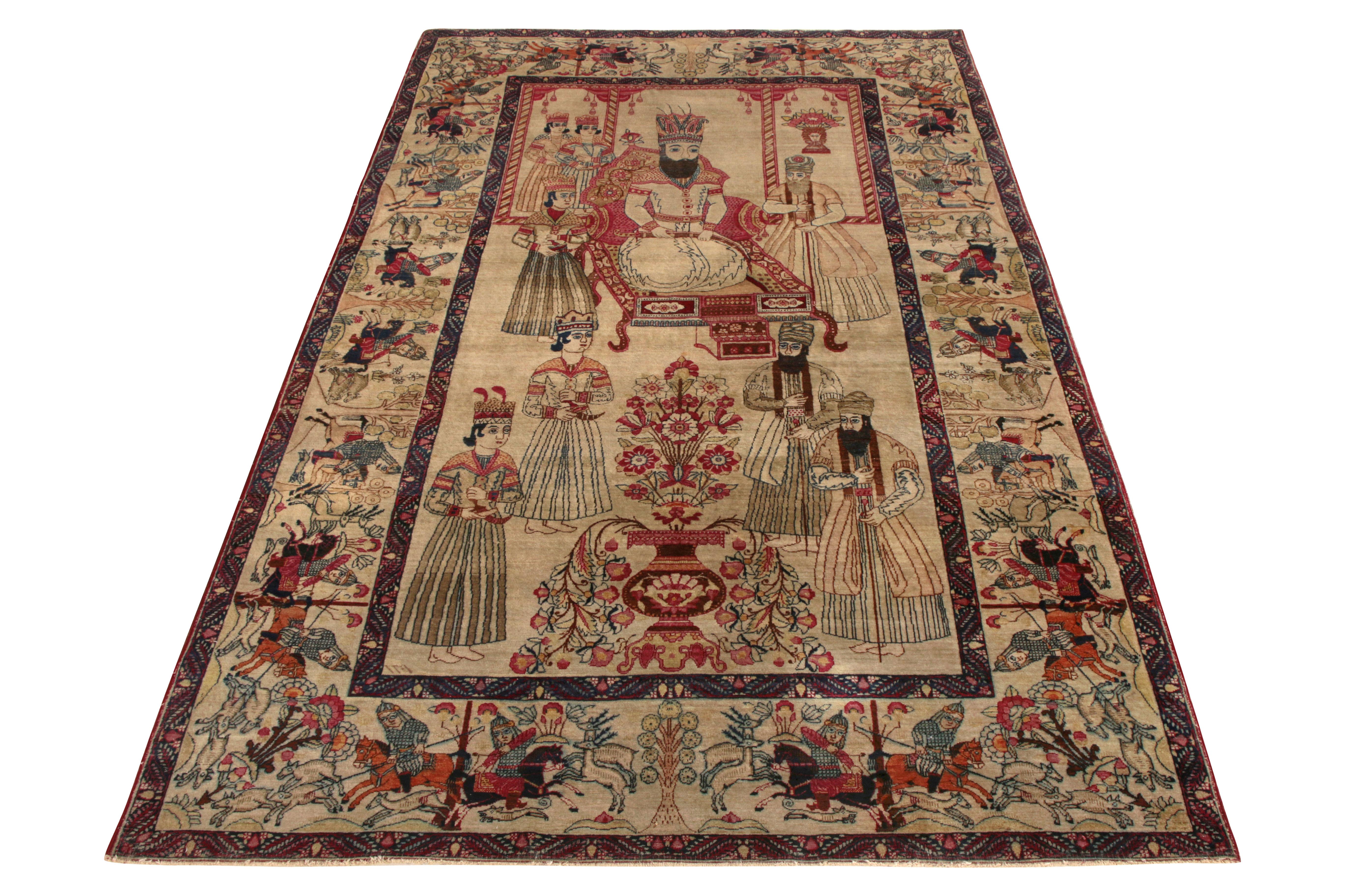 Hand knotted in wool, this 5 x 8 Kerman rug joins Rug & Kilim’s Antique & Vintage collection. The classic rendering of this drawing depicts a royal courtroom in a majestic setting, complemented by a tasteful mix of bold Blue and Red against a lush