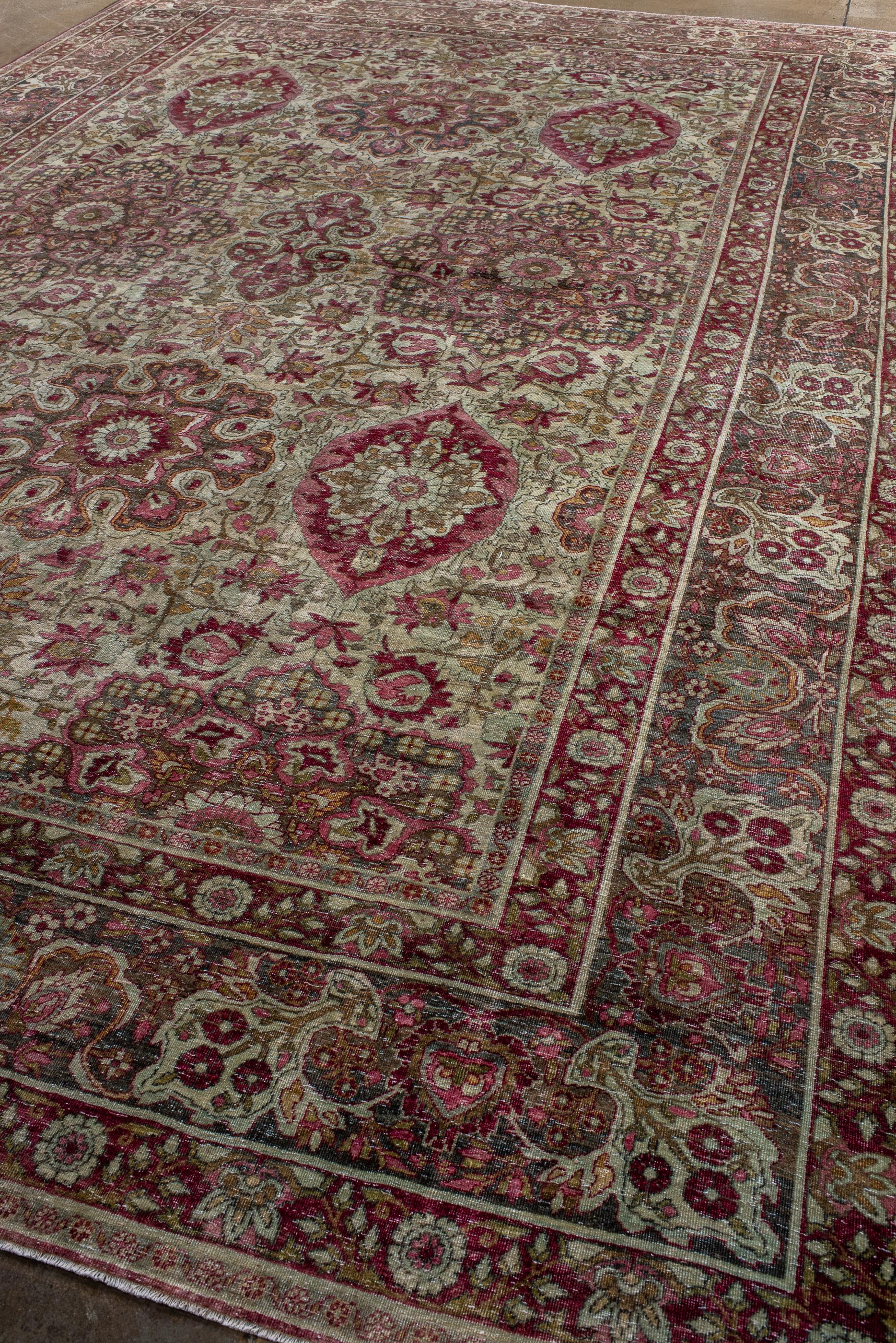 Persian Antique Kerman Rug with Cream Field and Red Floral Design For Sale