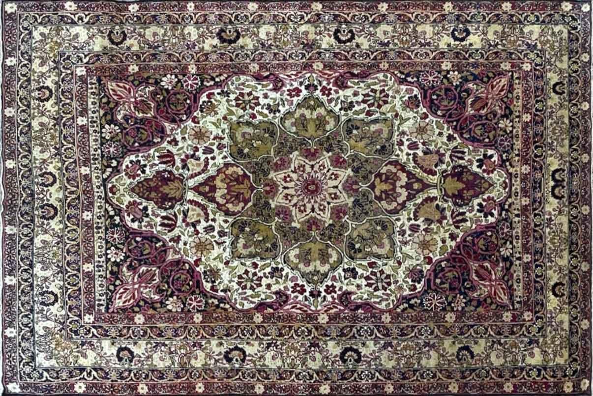 Discover the allure of the Kermanshah or Laver Kerman rug, a Southeast Persian treasure that captures a pictorial narrative of the Qajar kingdom. These rugs originate from a rich tradition dating back to the 16th century Safavid dynasty, marking