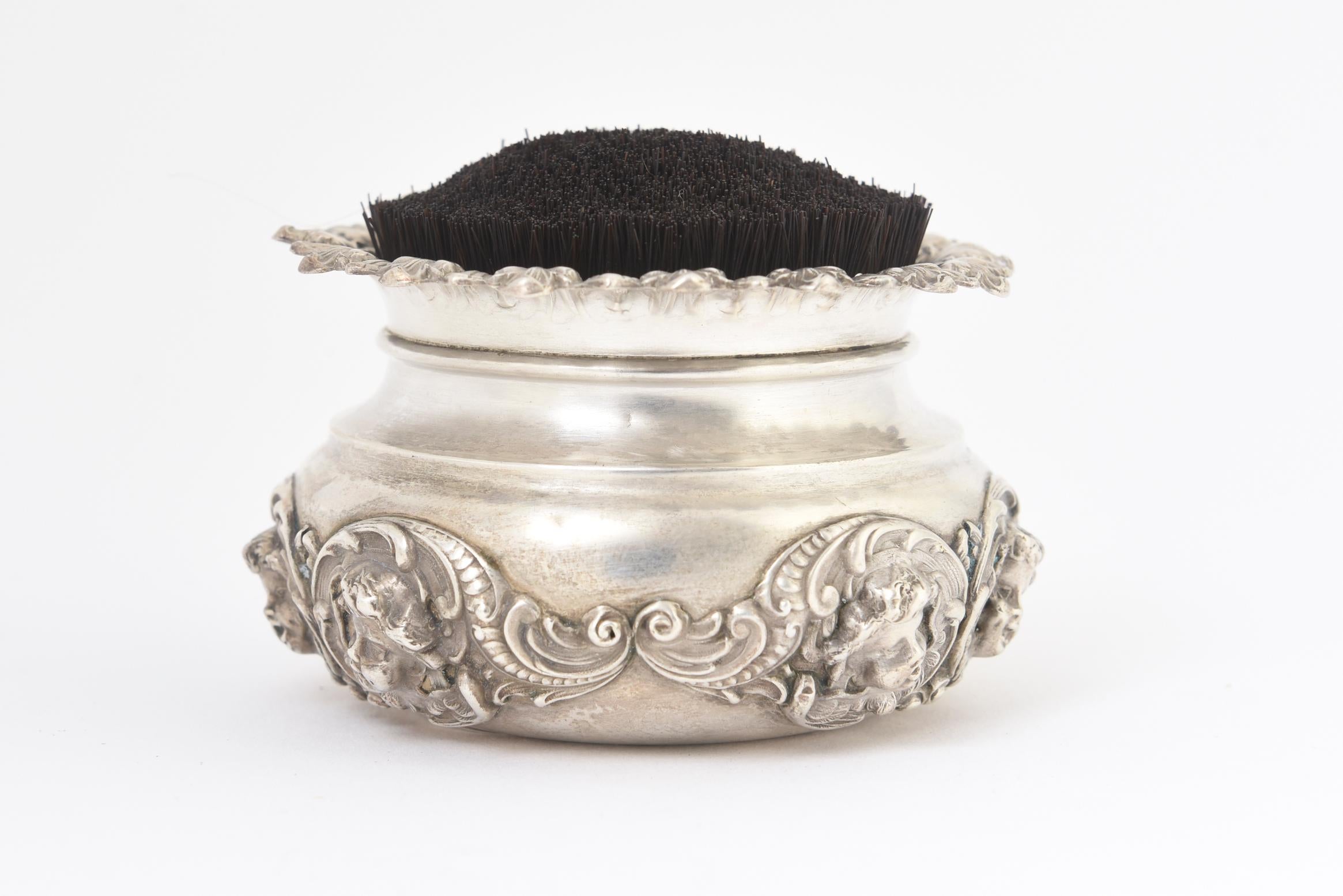 Late 19th century sterling silver cherub clothing brush by William B. Kerr & Co. Newark, New Jersey. Marked 