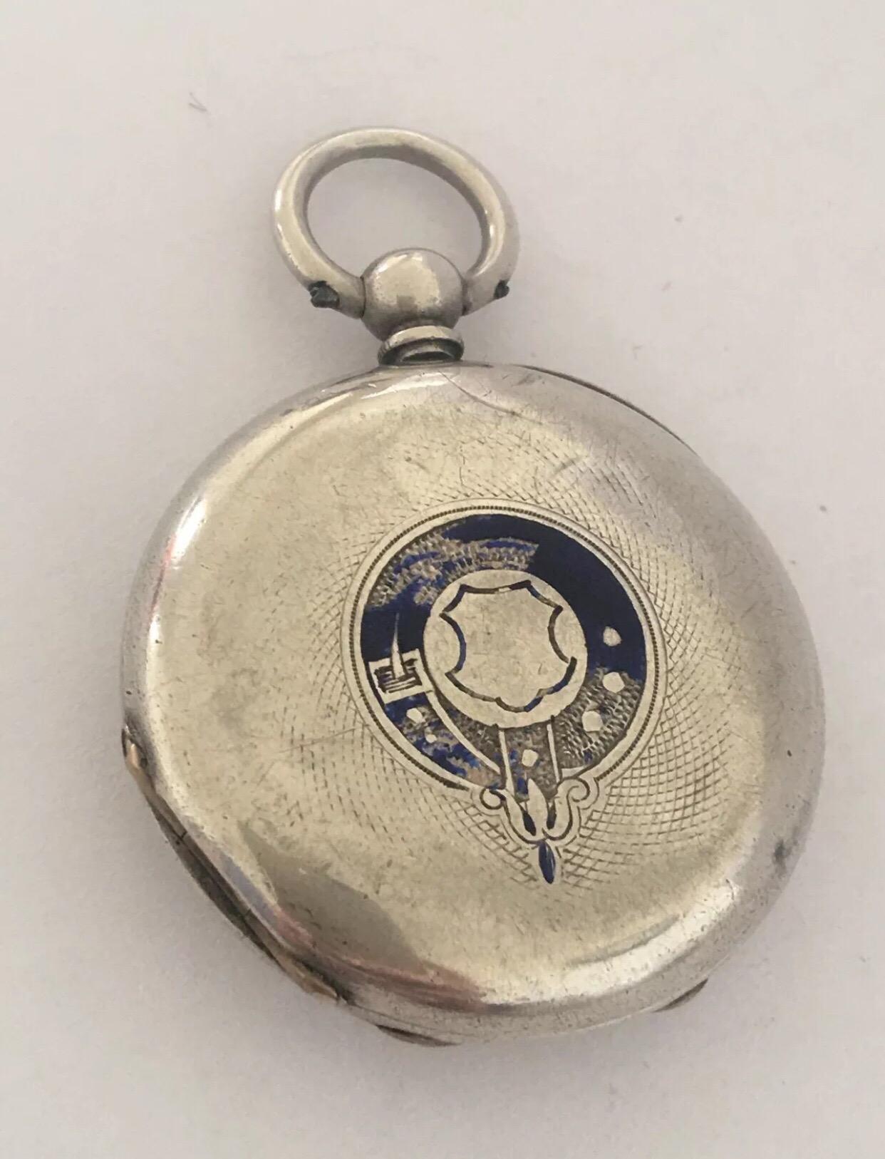 Antique Key-wind Silver Half Hunter Pocket Watch.


This watch is working and ticking well. The glass is missing. Visible chipped on the back cover blue enamel emblem and few dents on the back cover case