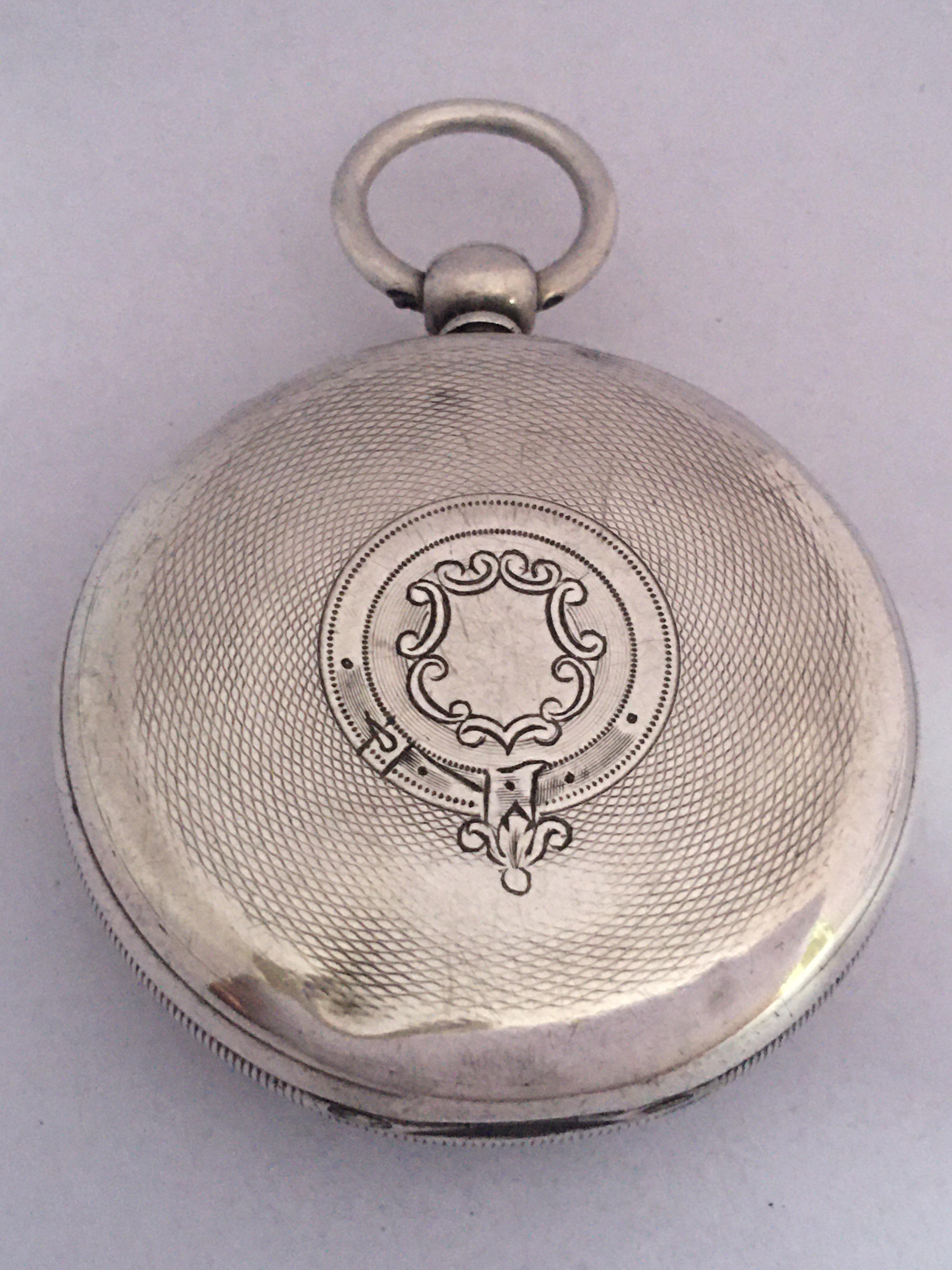 Antike Taschenuhr mit Schlüsselaufzug aus Silber 10