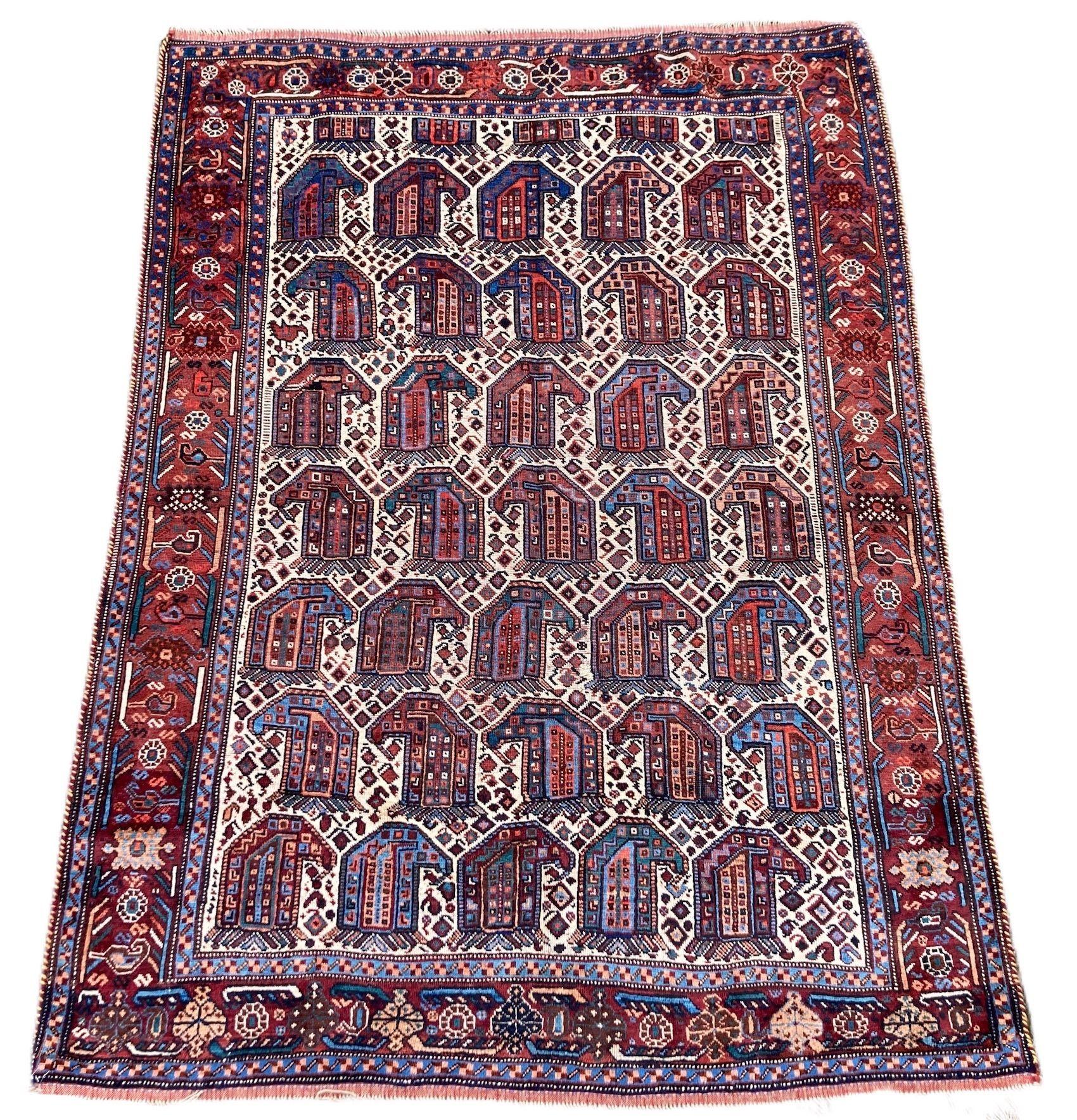A beautiful antique Khamseh rug, hand woven circa 1900 with an all over Boteh design on an ivory field and terracotta border. Try to find the solitary Khamseh chicken! Great secondary colours and a great example of tribal weaving.
Size: 1.90m x